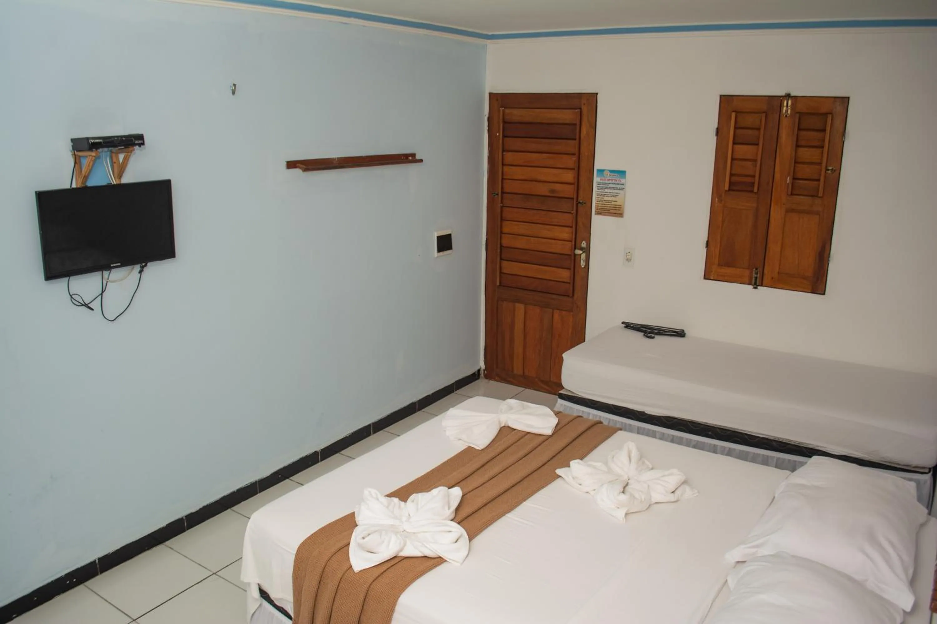 Bed in Pousada Numei de Jeri