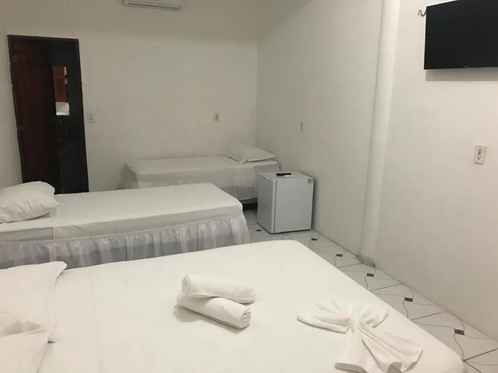 Bed in Pousada Numei de Jeri