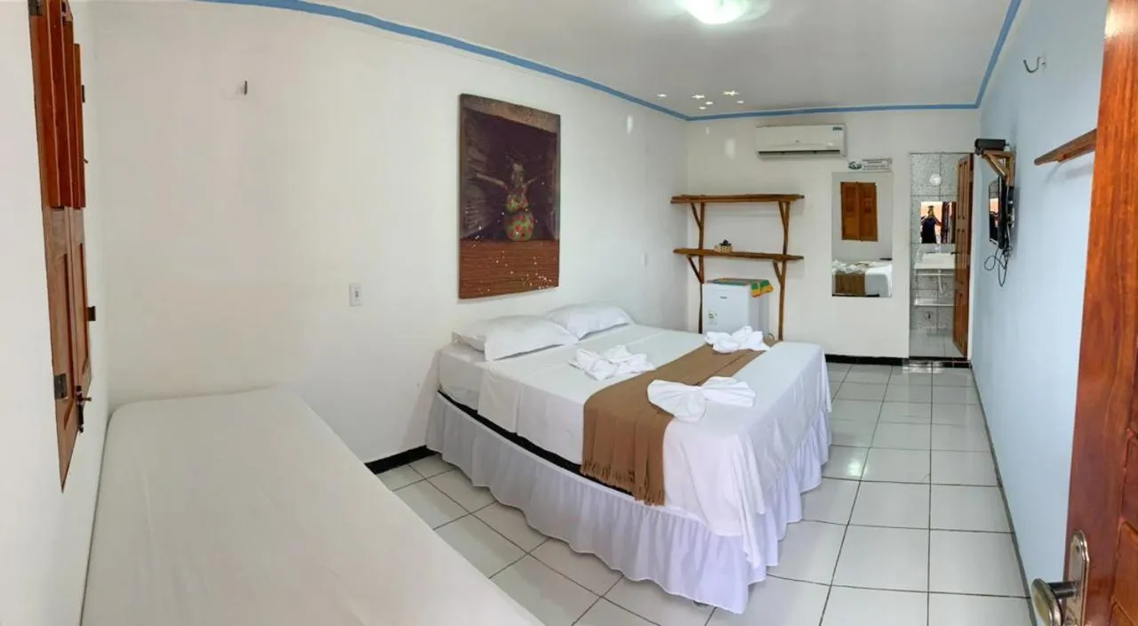 Bed in Pousada Numei de Jeri