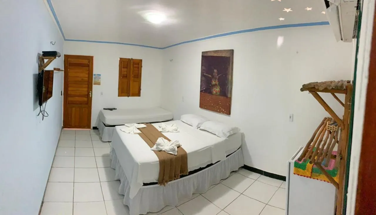 Bed in Pousada Numei de Jeri