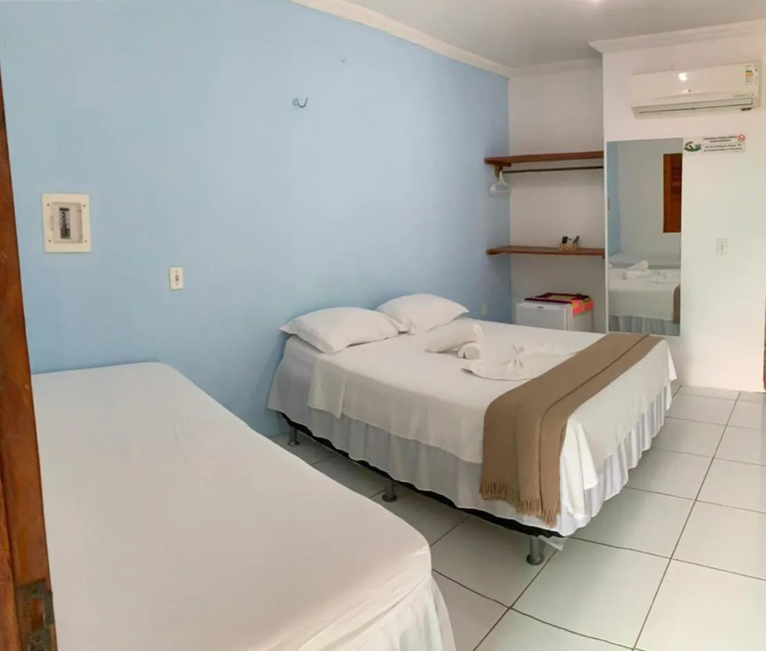 Bed in Pousada Numei de Jeri