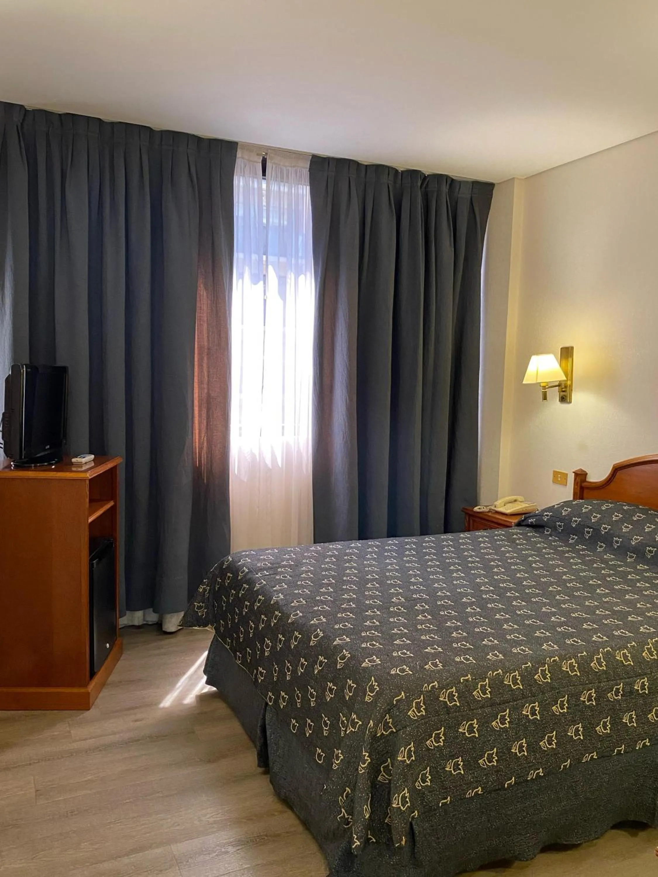 Bed in ATLAS TOWER HOTEL