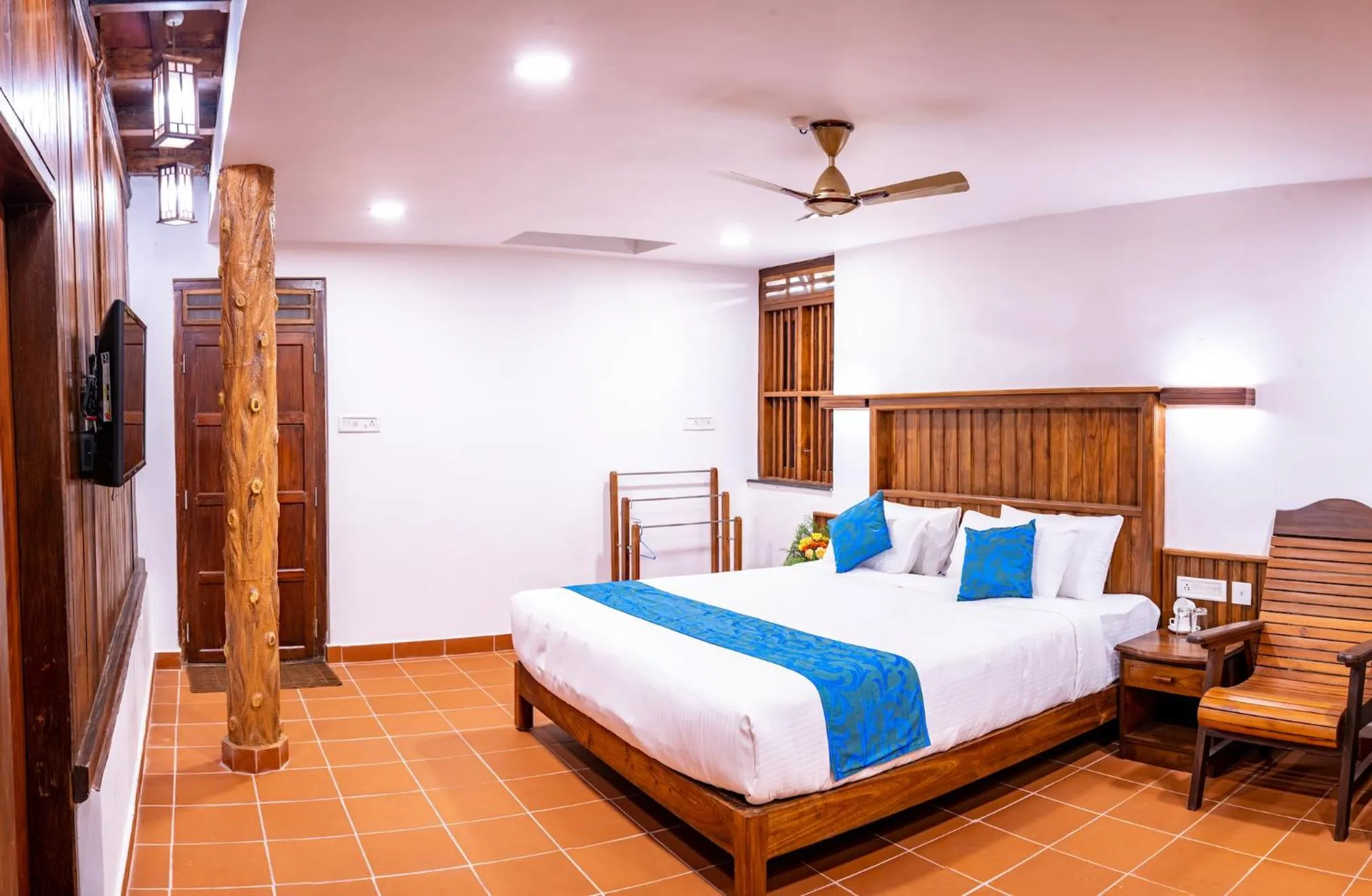 Bed in Kalpavanam Heritage Resort