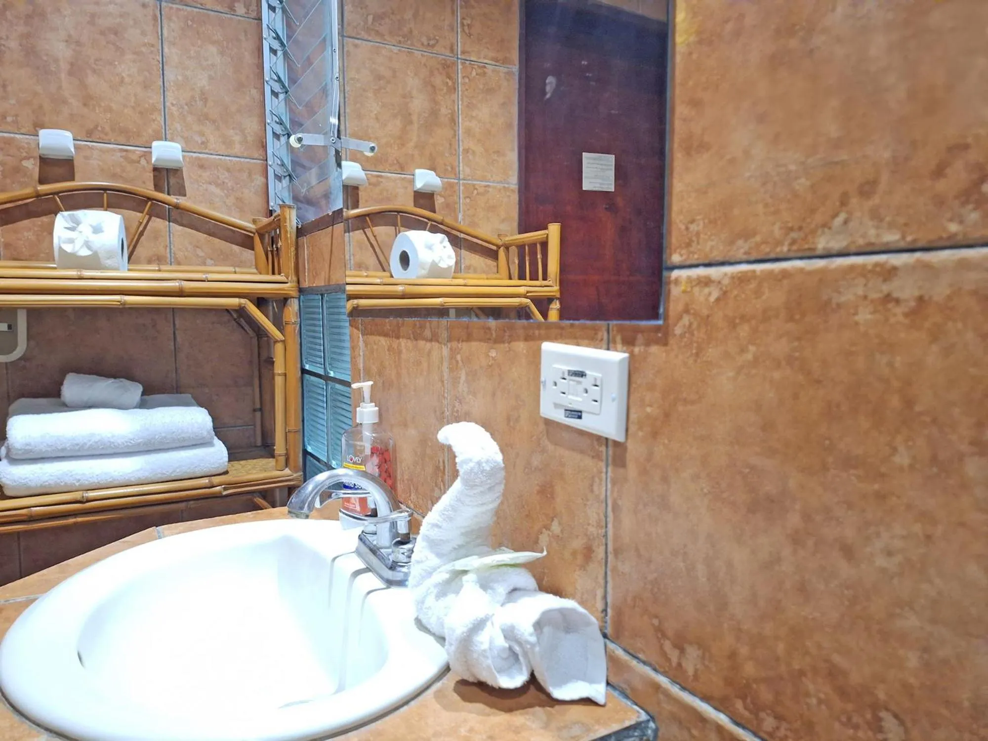 Bathroom in Colours Oasis Resort ADULT ONLY