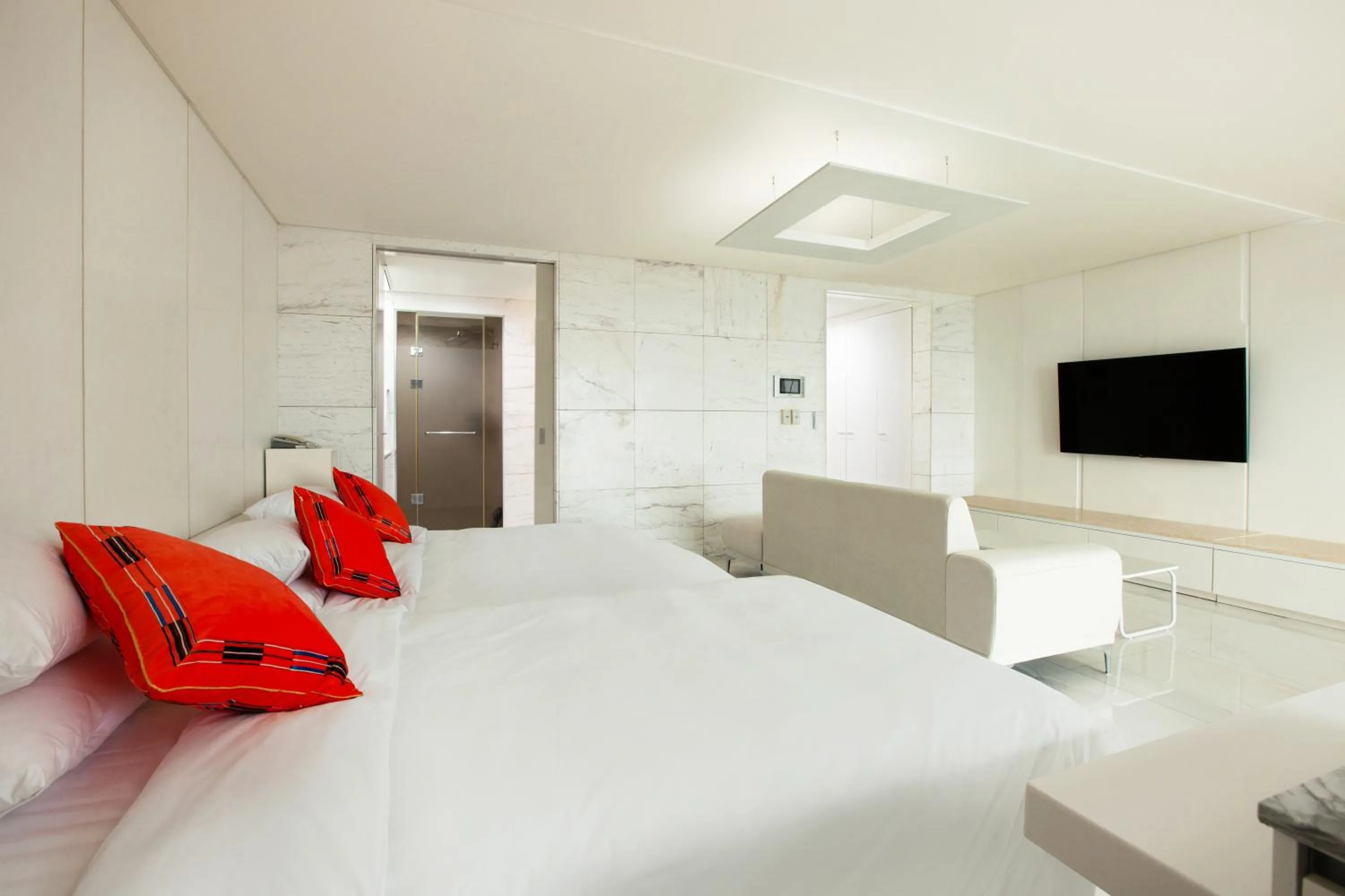 Decorative detail, Bed in Shin Shin Hotel Jeju Ocean