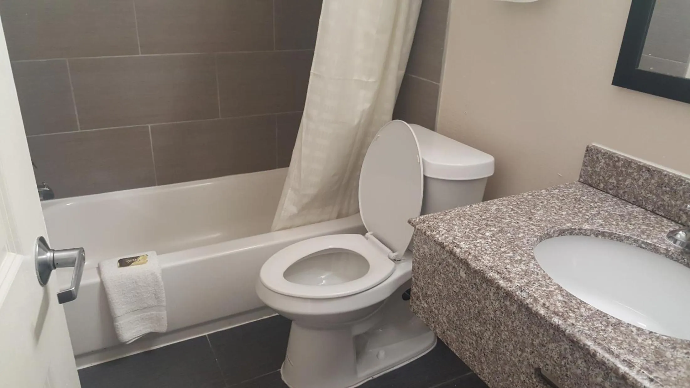 Bathroom in REGENCY INN & SUITES