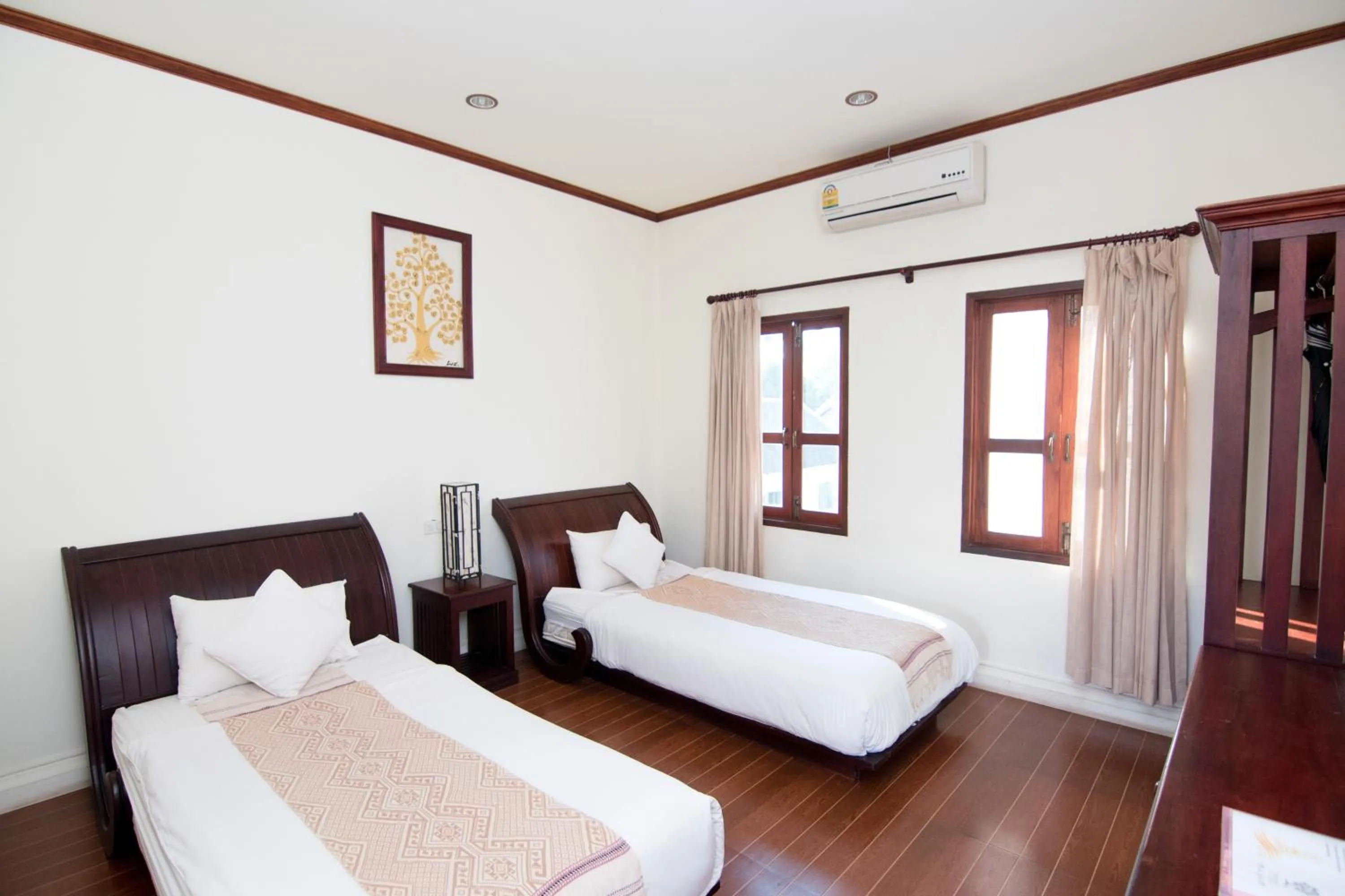 Bed in Luang Prabang Legend Hotel