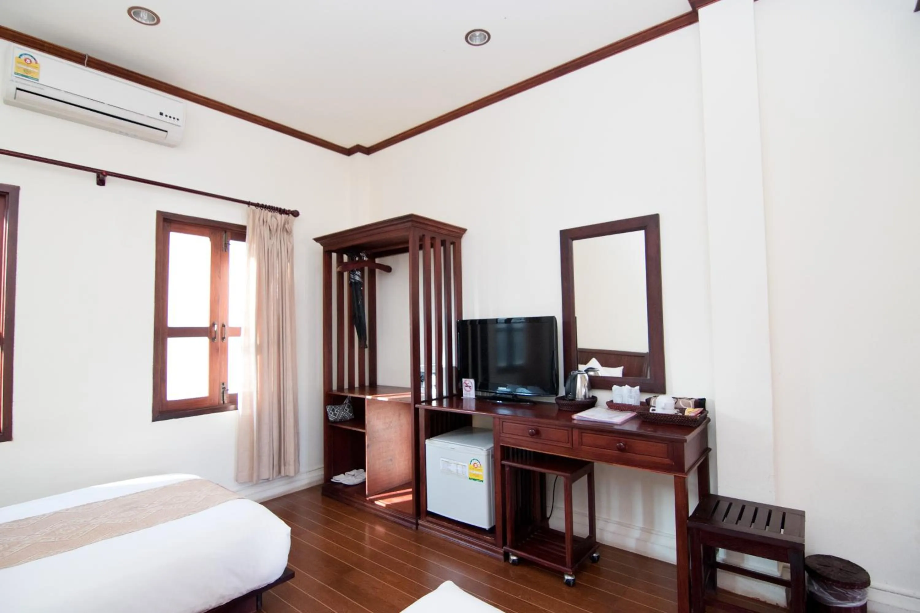 Bed in Luang Prabang Legend Hotel