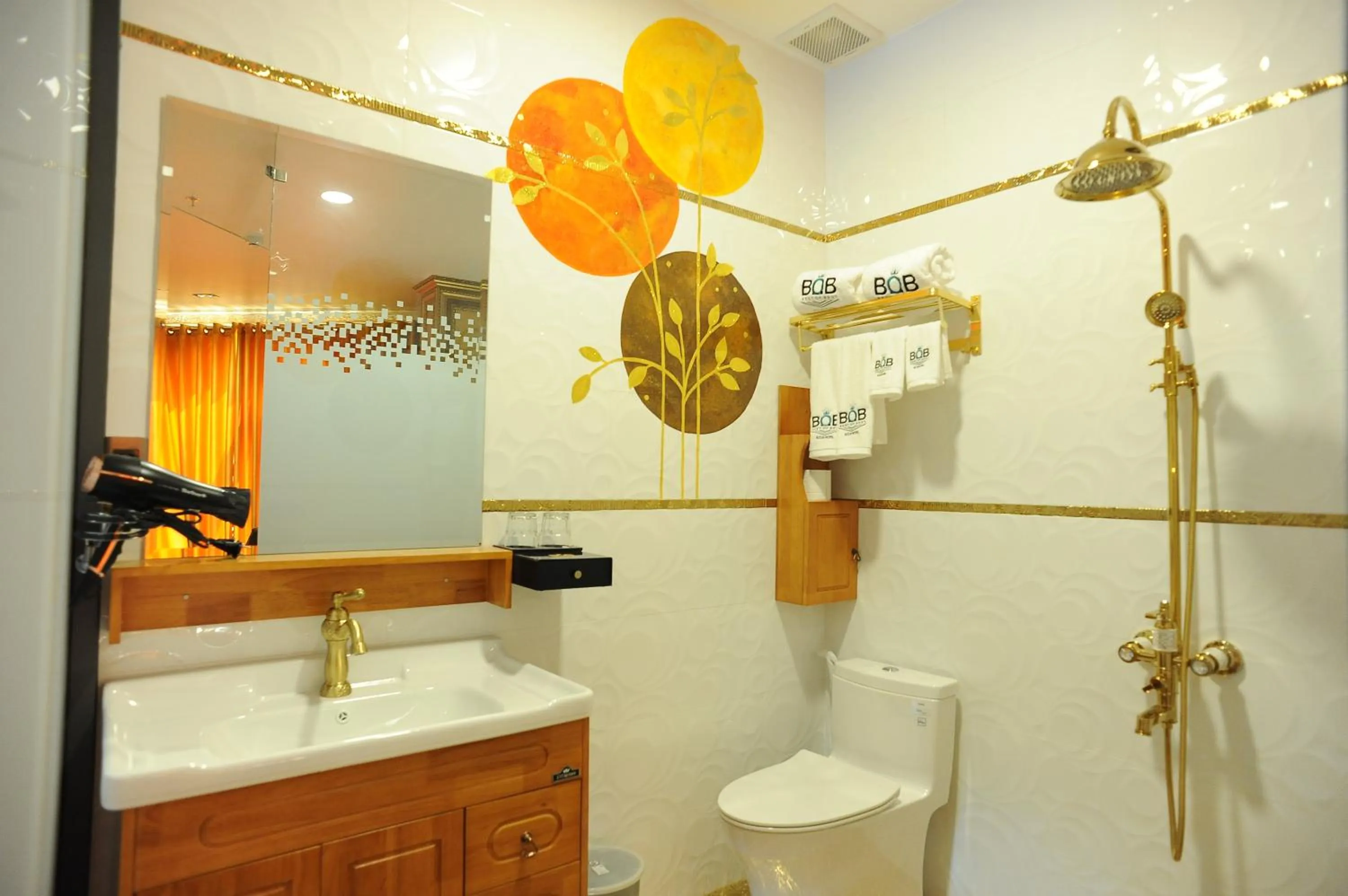 Toilet in B.O.B HOTEL SIGNATURE