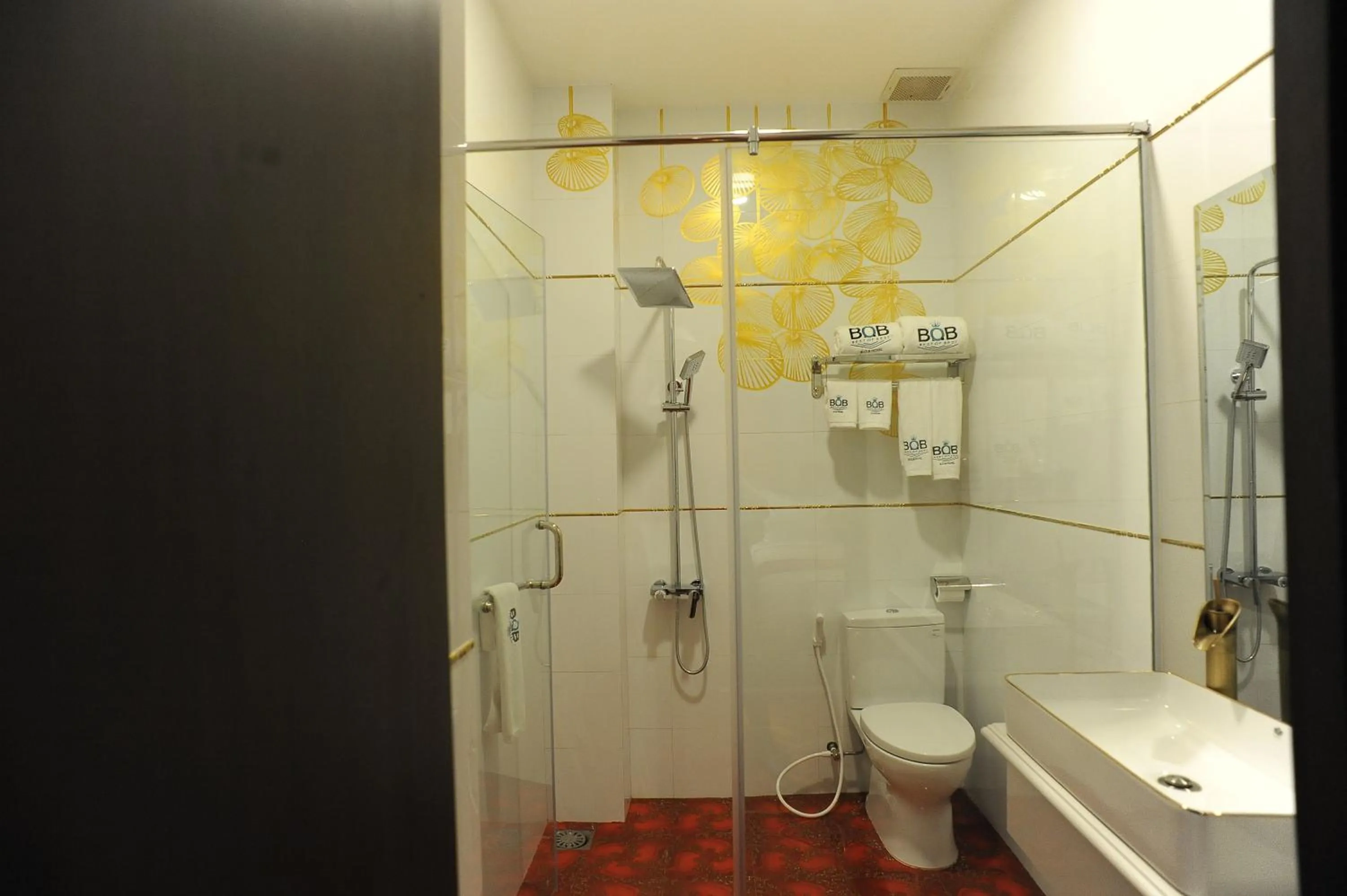 Toilet in B.O.B HOTEL SIGNATURE