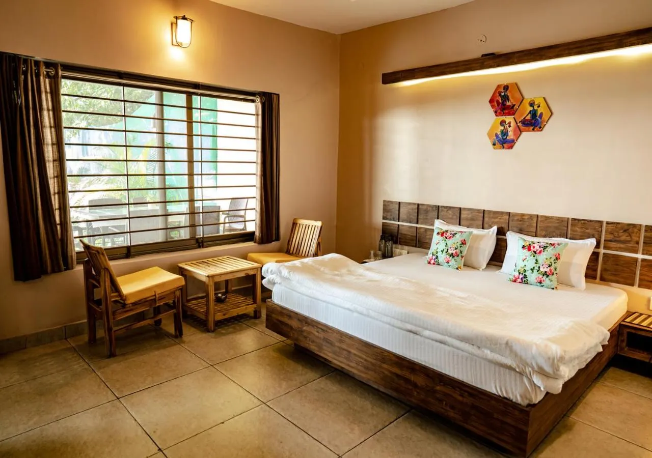Photo of the whole room, Bed in The Satpura Panchtatva Villa