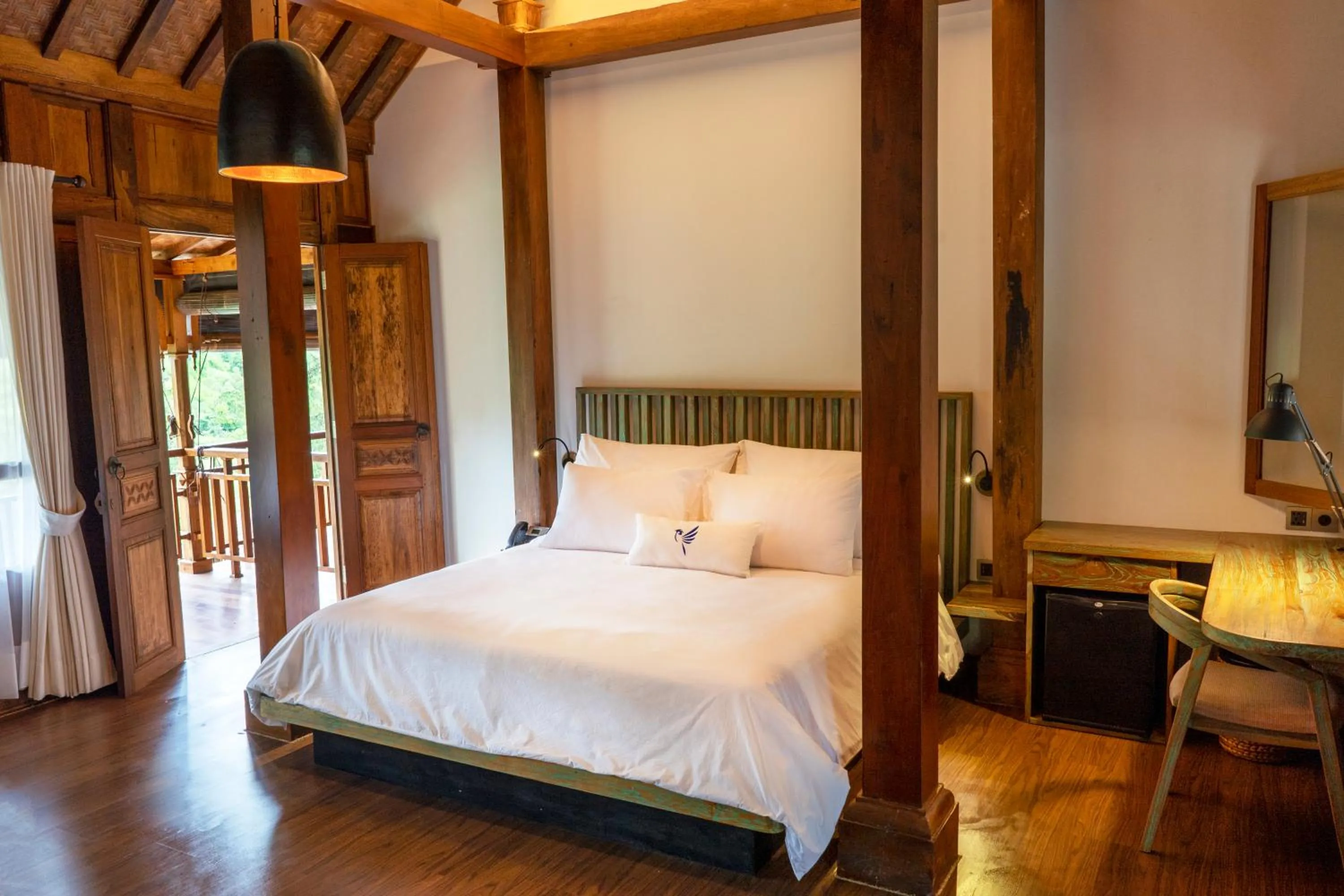 Bed in Tira Vilagna Suites & Spa