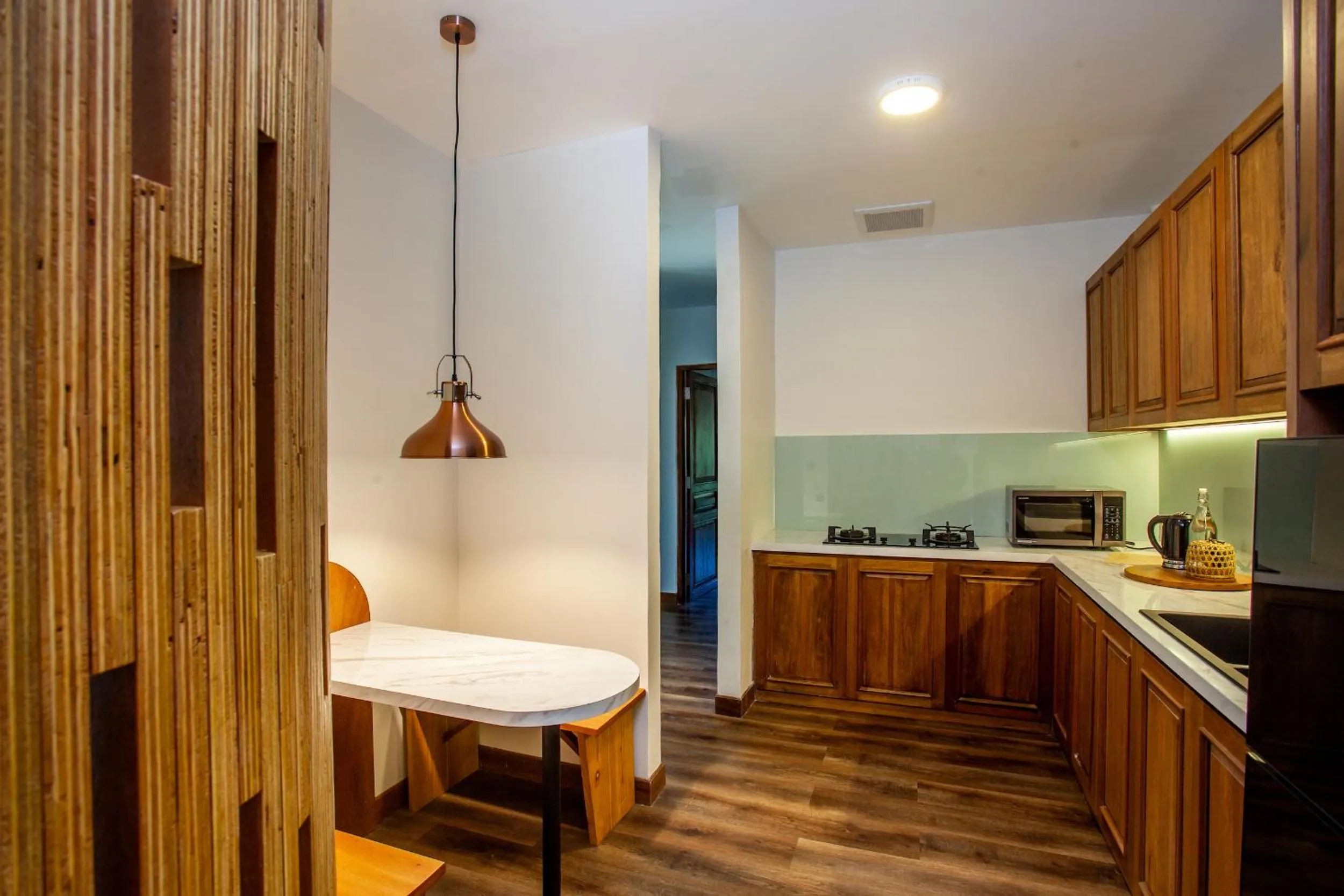 Kitchen or kitchenette in Tira Vilagna Suites & Spa