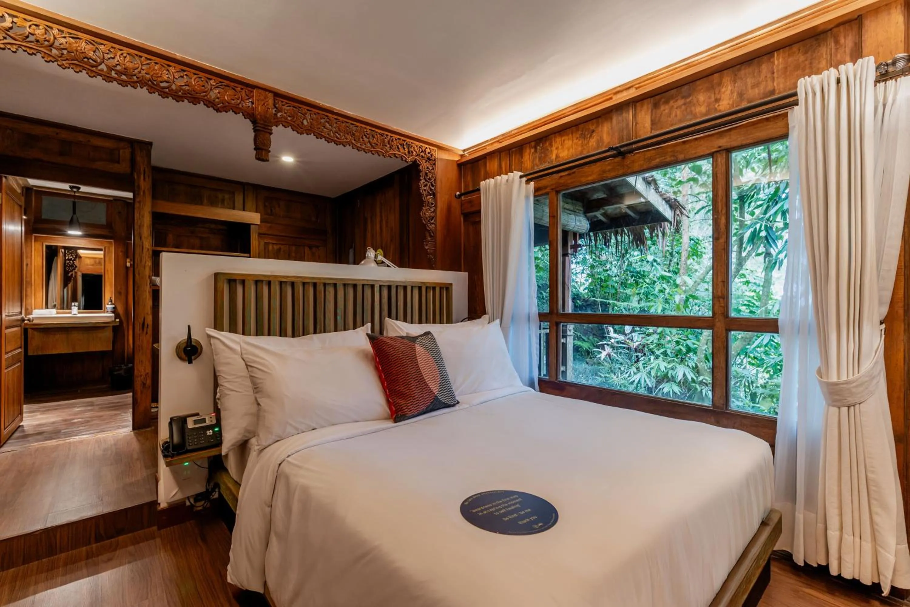 Bed in Tira Vilagna Suites & Spa