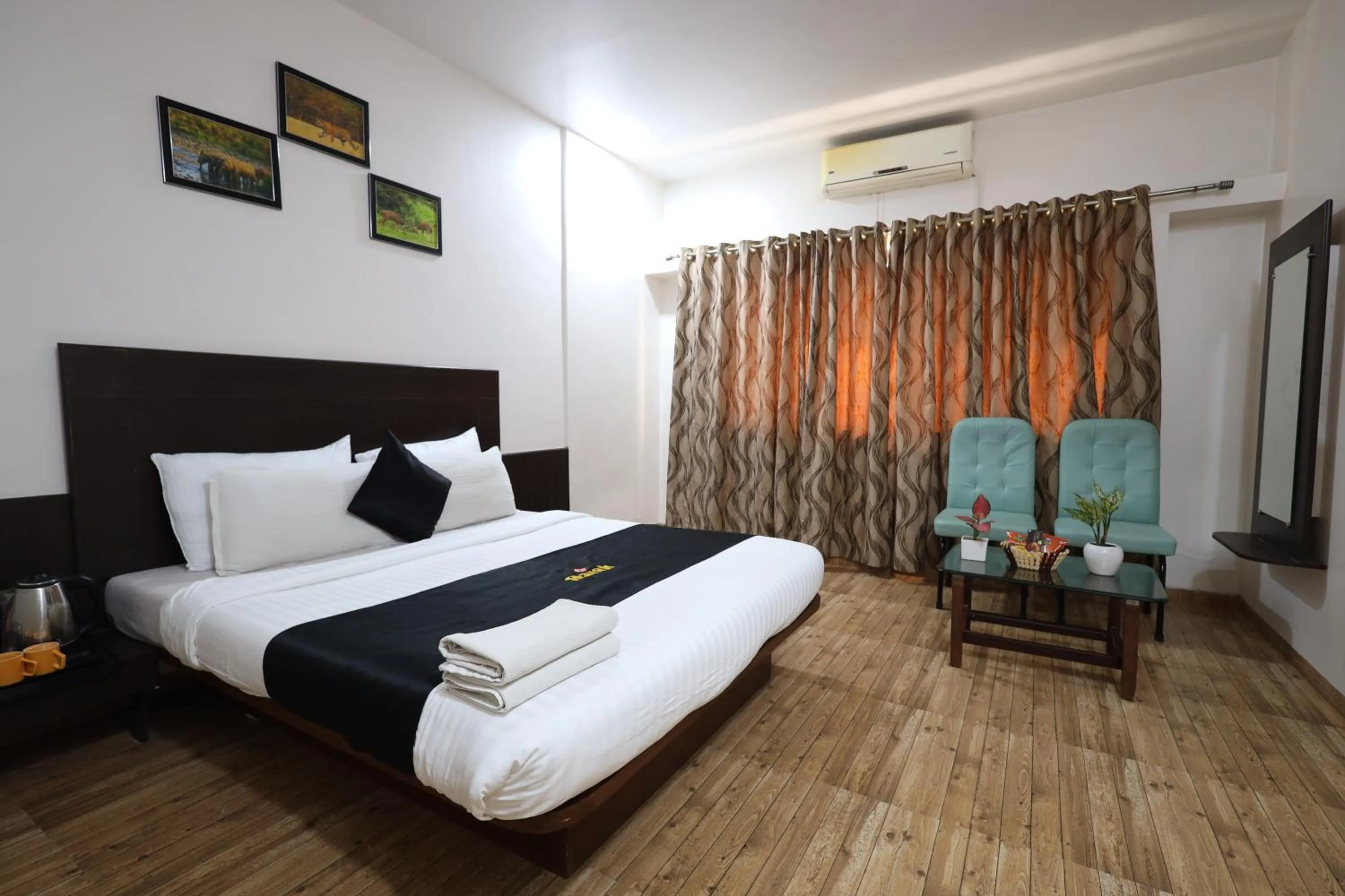 Bed in Saish Hotel Shirdi