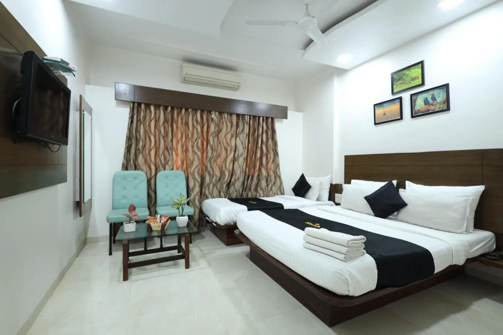 Bedroom, Bed in Saish Hotel Shirdi