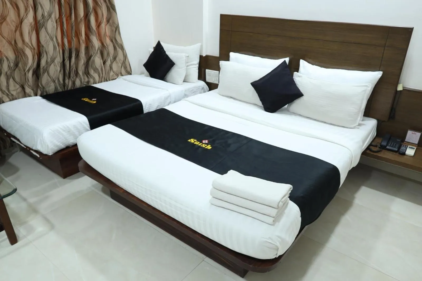 Bedroom, Bed in Saish Hotel Shirdi