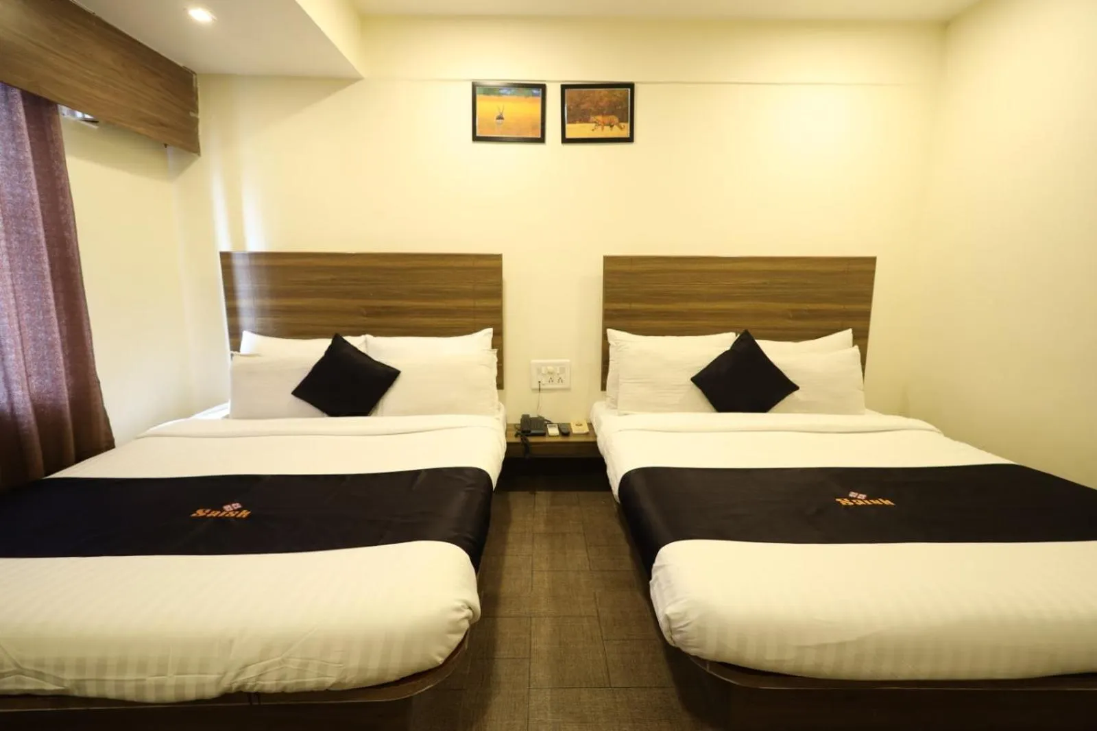 Bedroom, Bed in Saish Hotel Shirdi