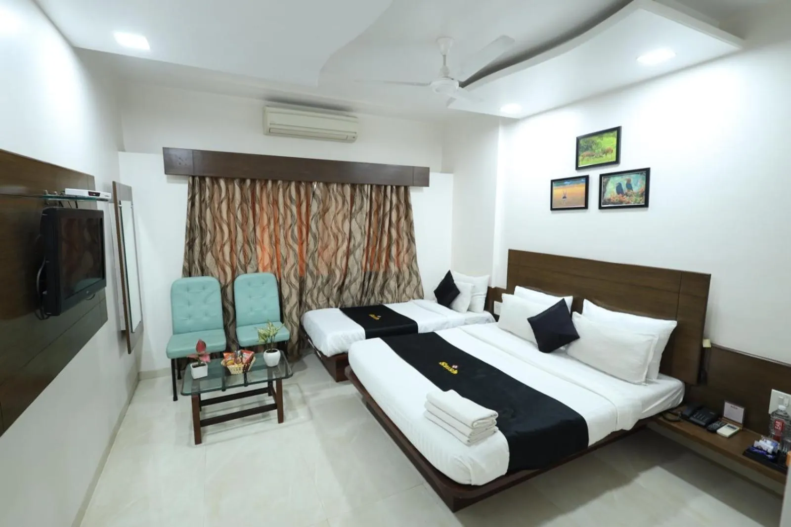 Bedroom, Bed in Saish Hotel Shirdi
