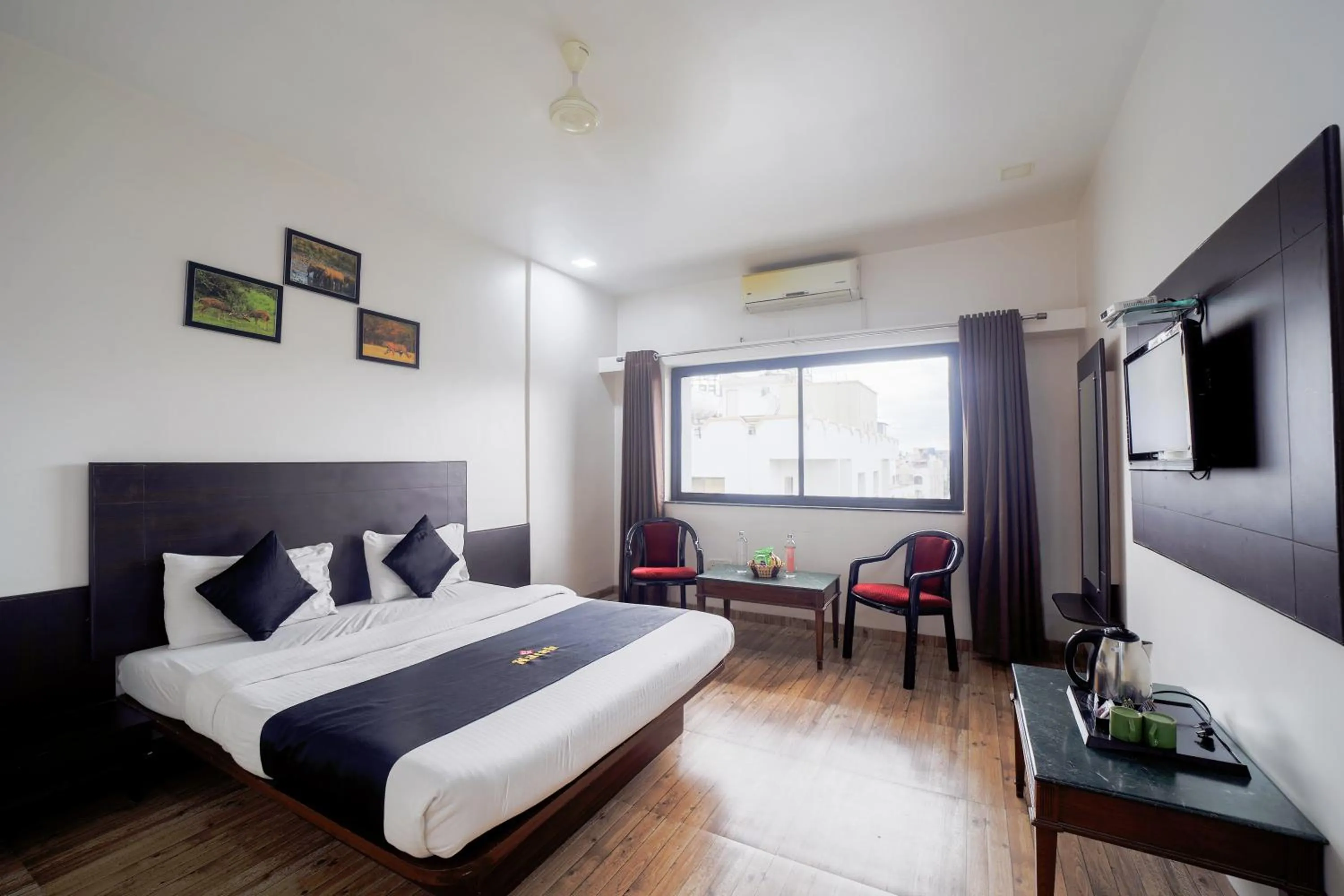 Property building, Bed in Saish Hotel Shirdi