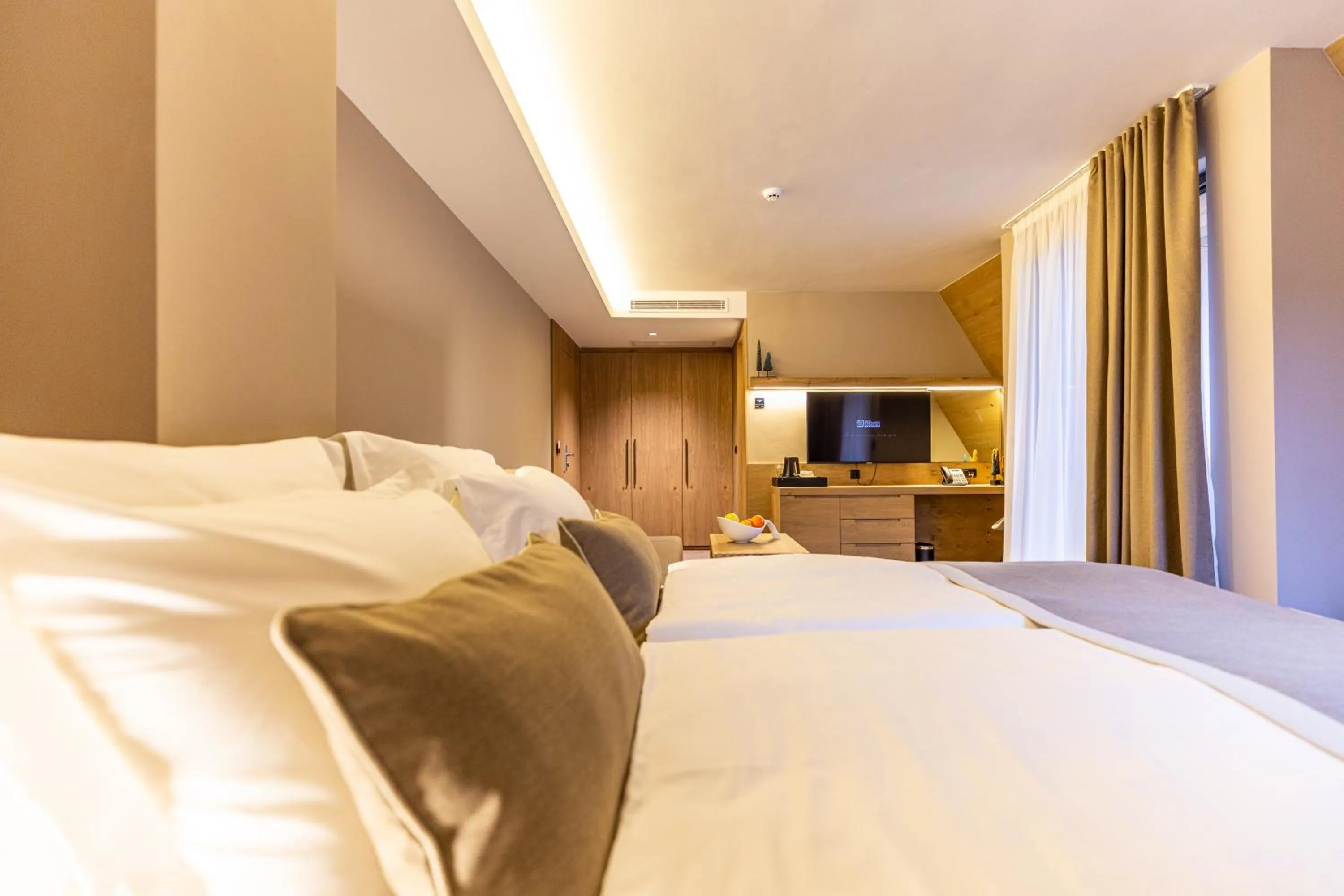 Bed in Hotel Monti Spa & Wellness