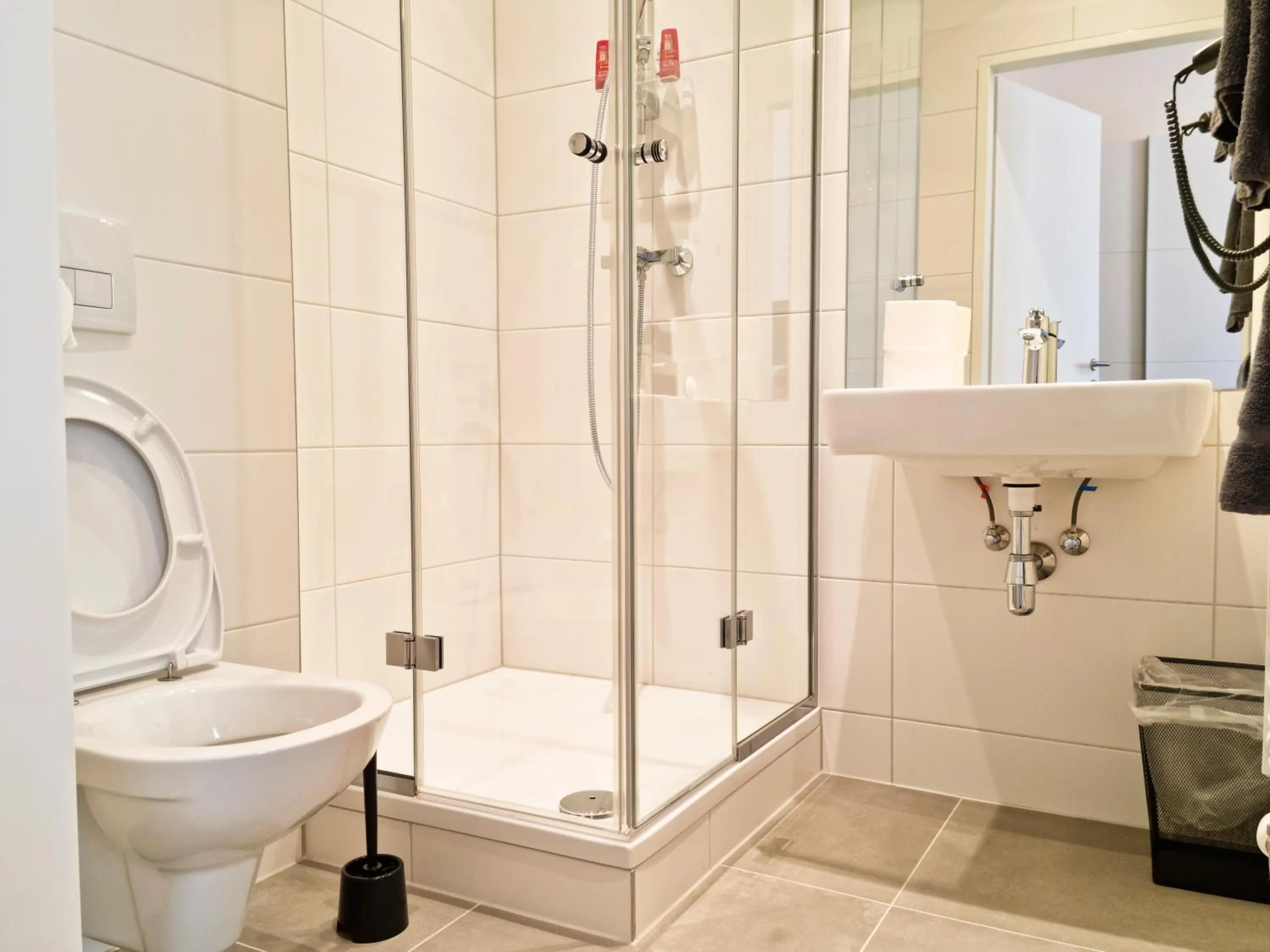 Bathroom in Pension Mozart - Newly Renovated