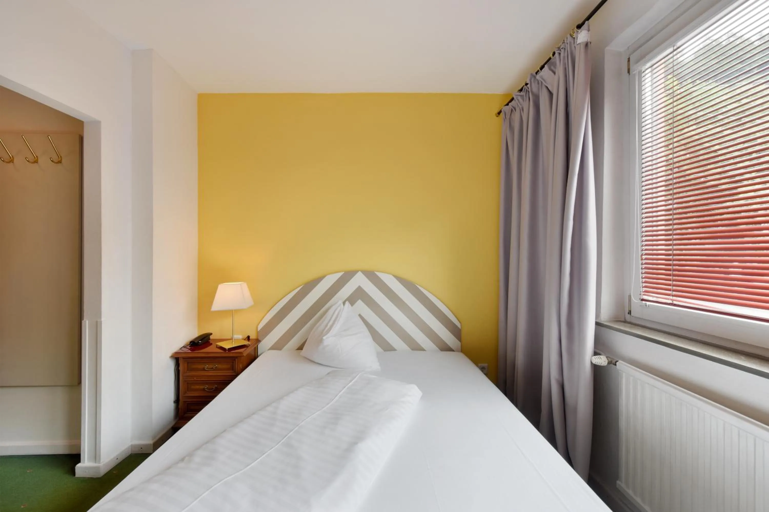Photo of the whole room, Bed in Am Neutor Hotel Salzburg Zentrum