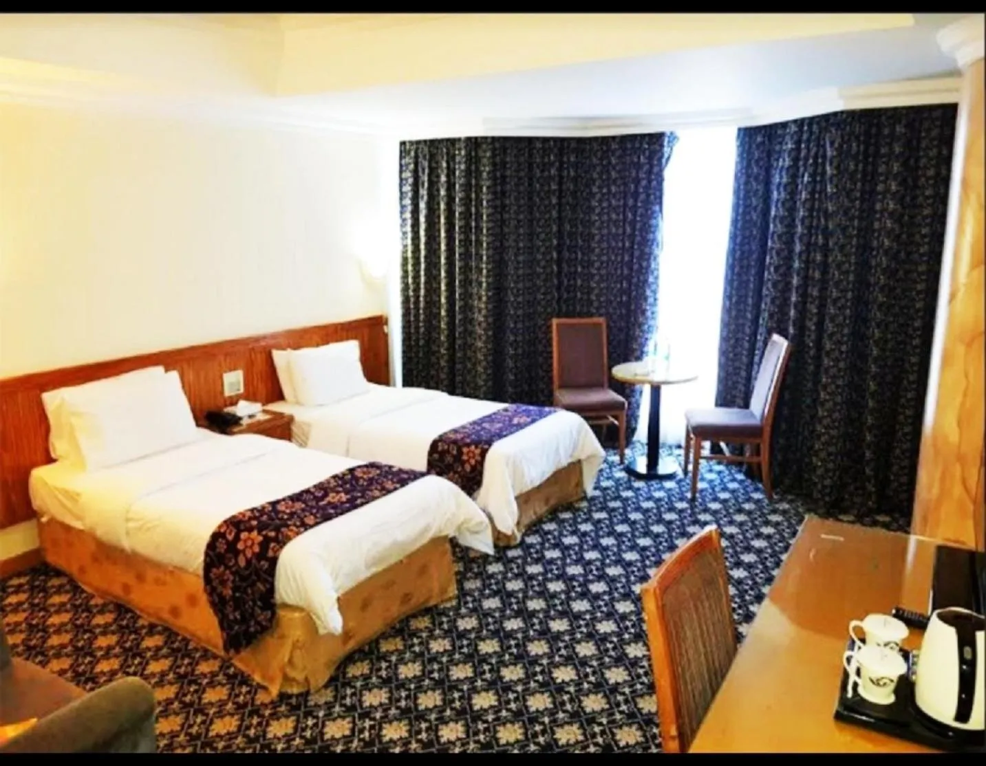 Coffee/tea facilities, Bed in Phoenicia Tower Hotel And Spa