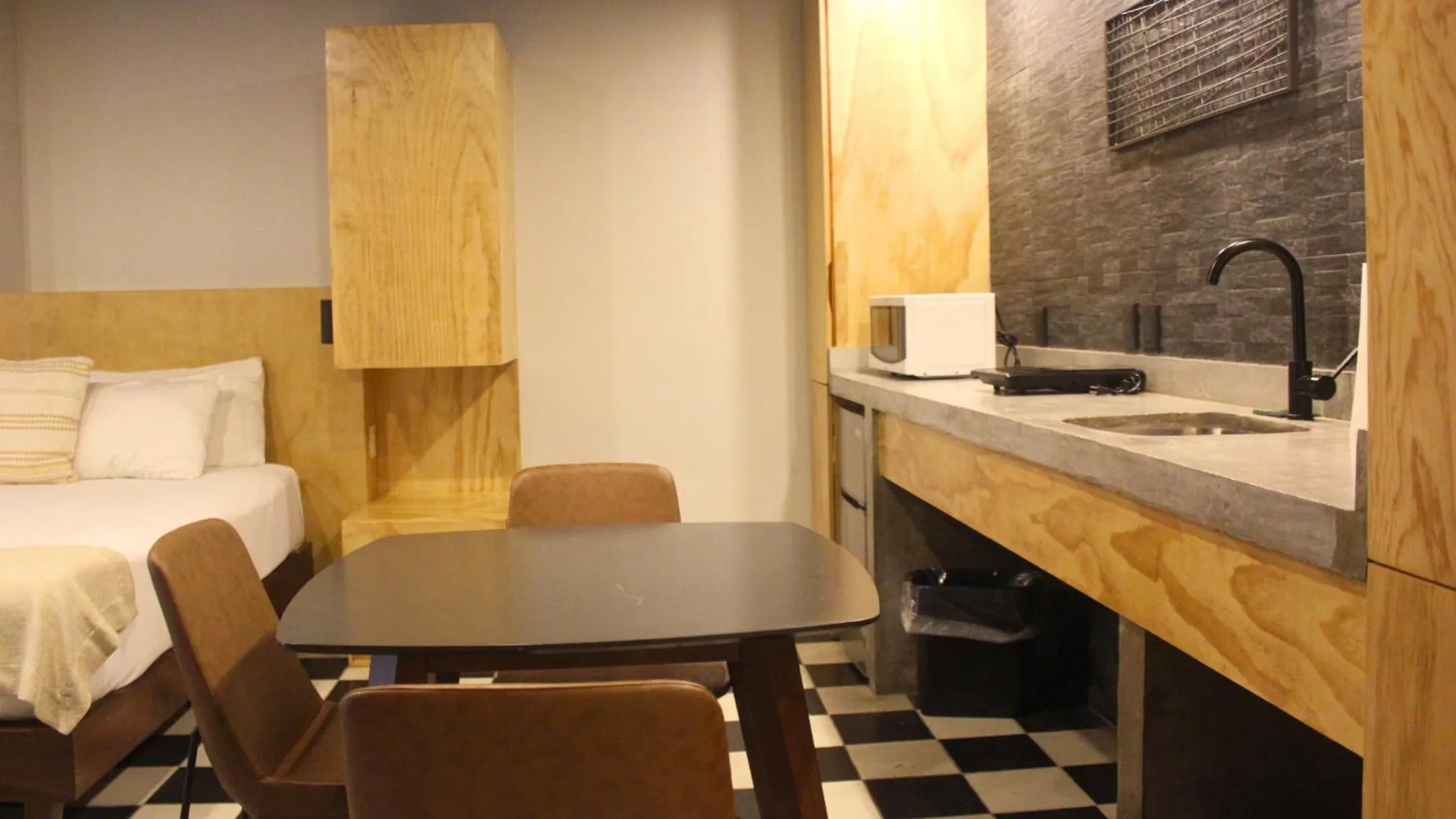 Kitchen or kitchenette, Bed in Joint Boutique Hotel