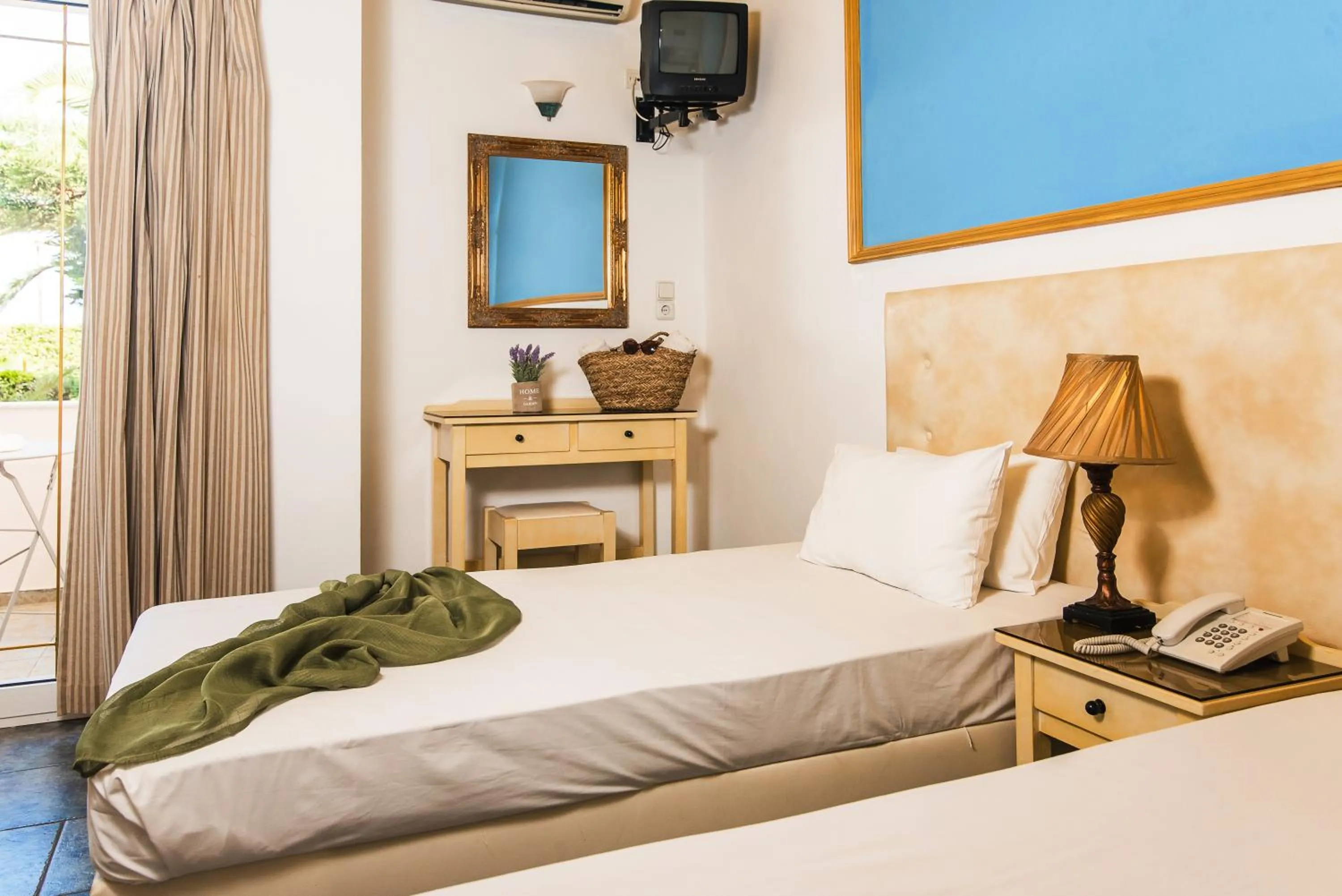 Photo of the whole room, Bed in Yiannis Manos Hotel Resort