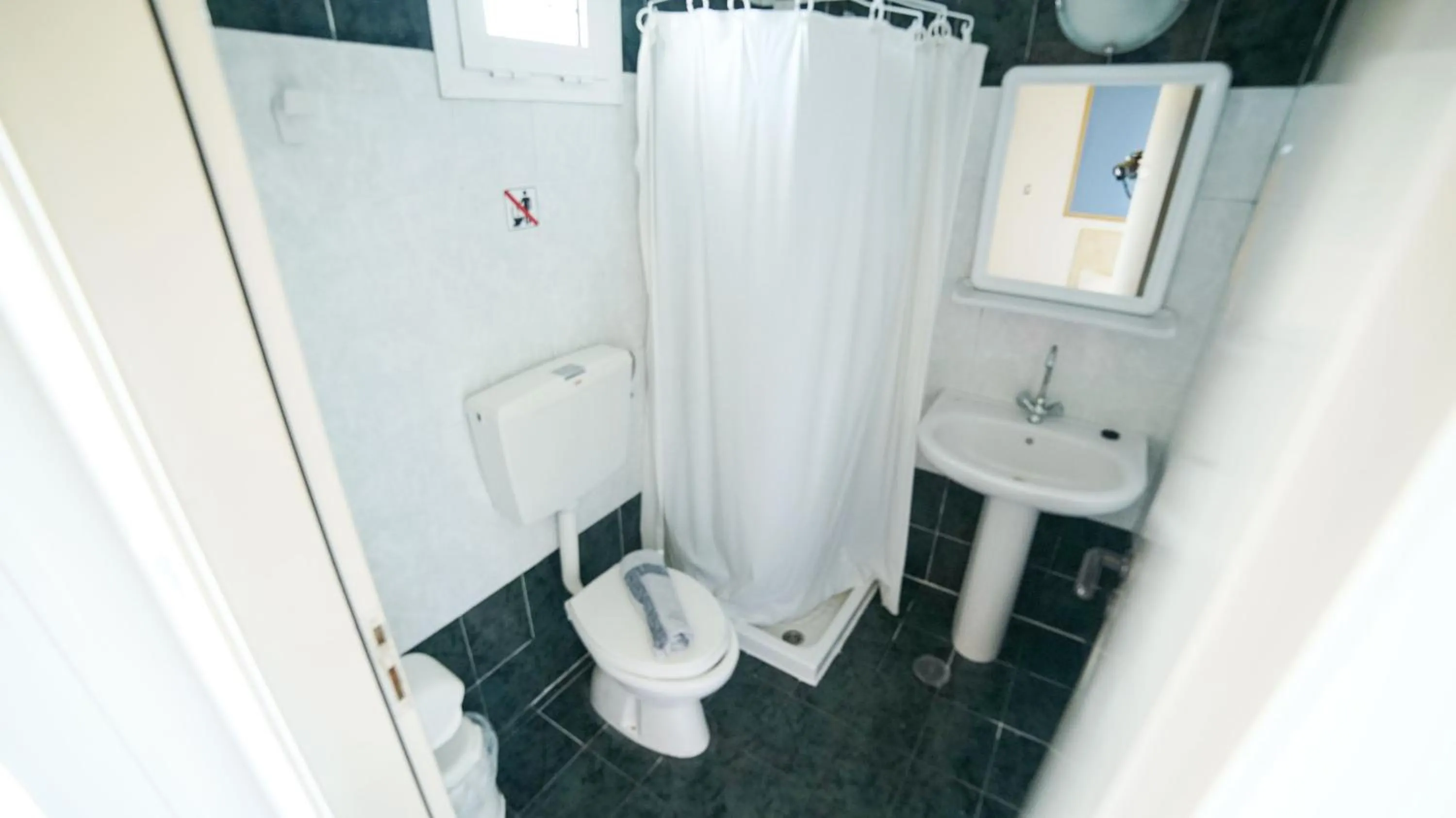 Bathroom in Yiannis Manos Hotel Resort