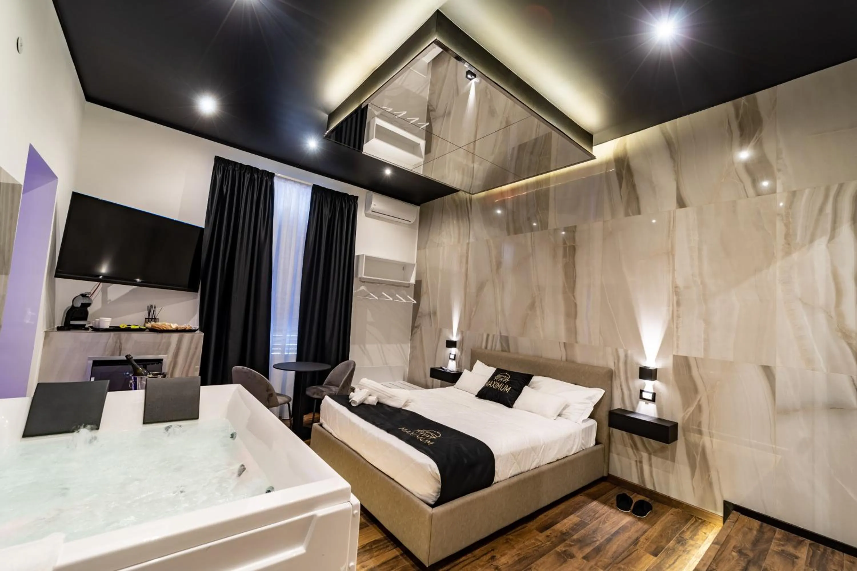 Bed in Maximum Suite & Spa