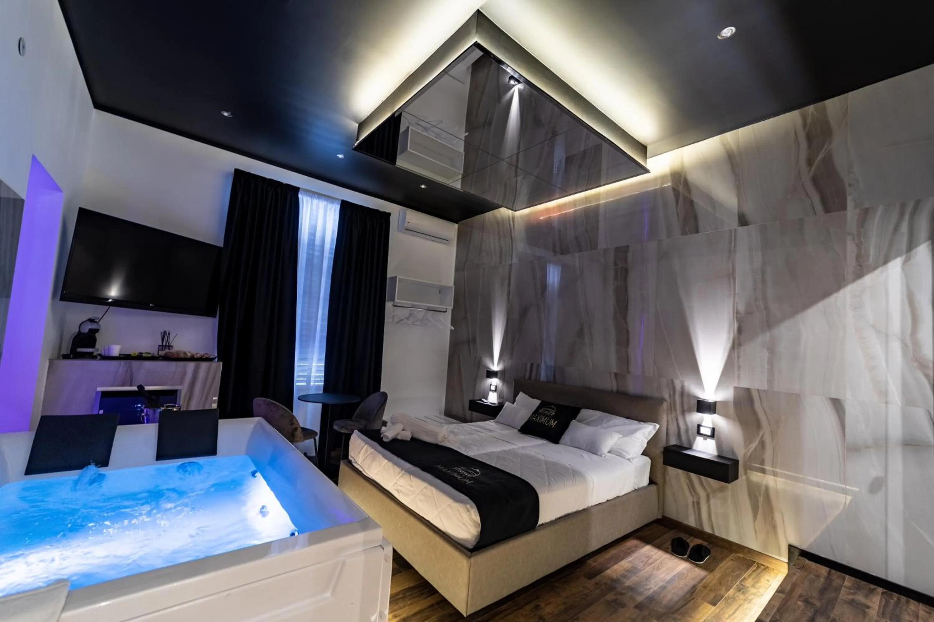 Bed in Maximum Suite & Spa