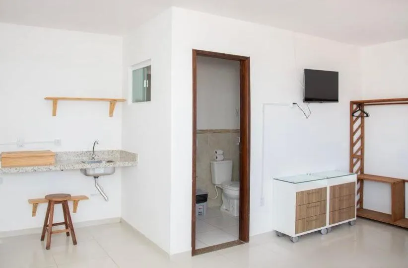 Toilet in Encanto da Praia hotel pousada