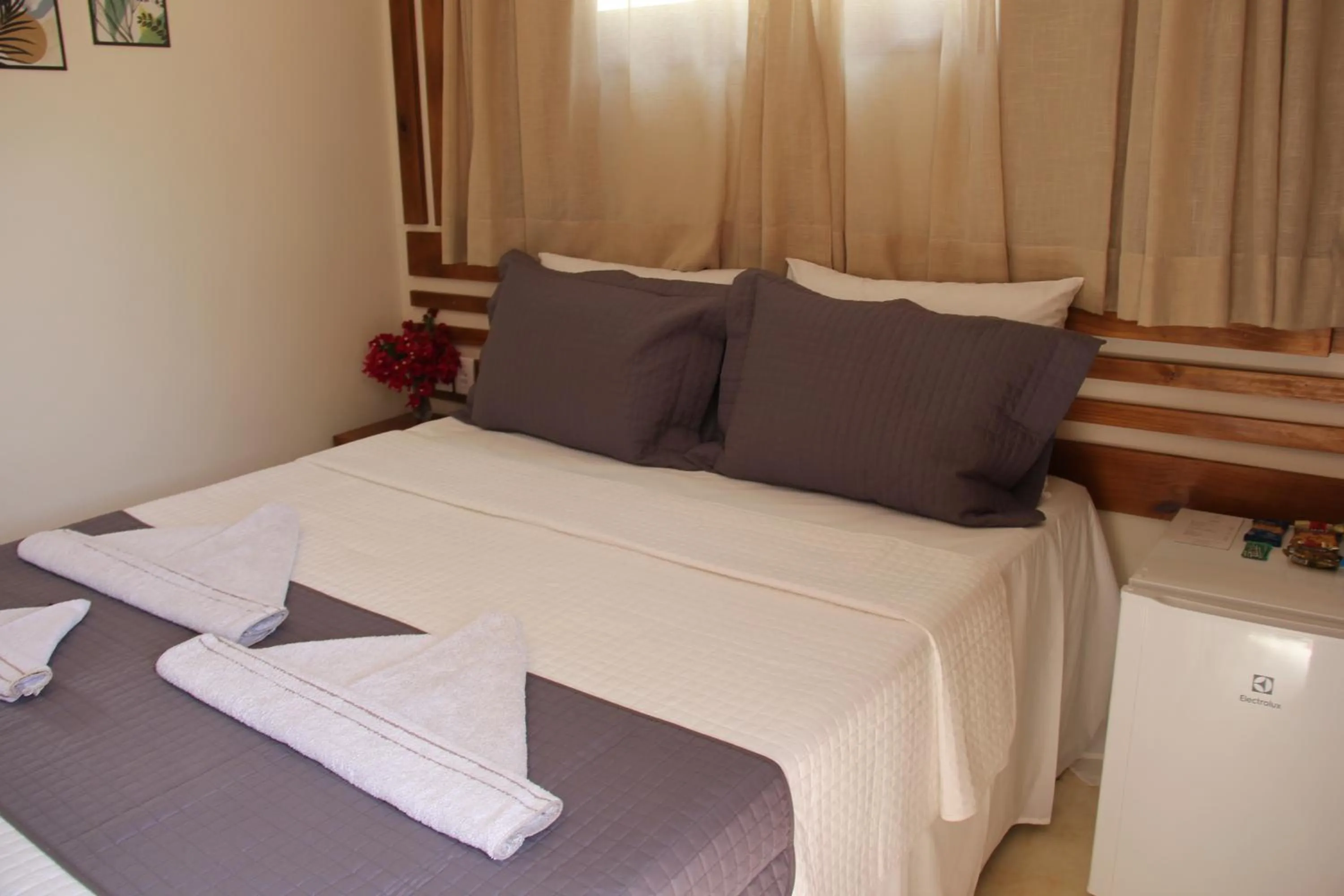 Bed in Kai'ala Pousada