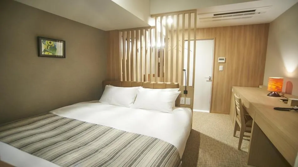 Bed in QuintessaHotel TokyoHaneda Comic&Books