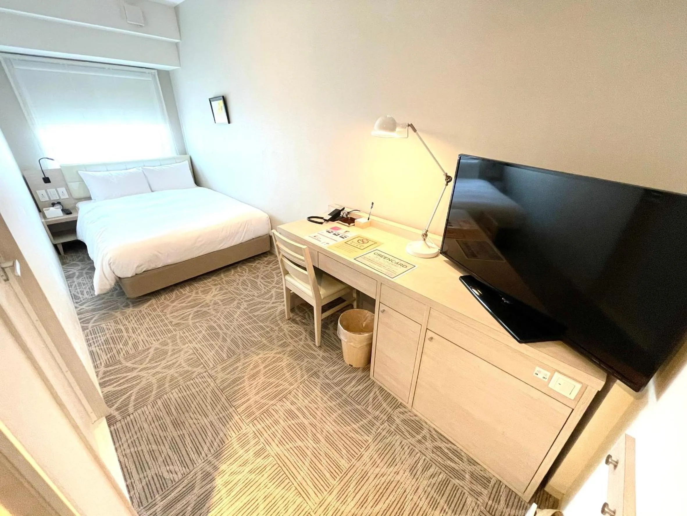 Bed in QuintessaHotel TokyoHaneda Comic&Books