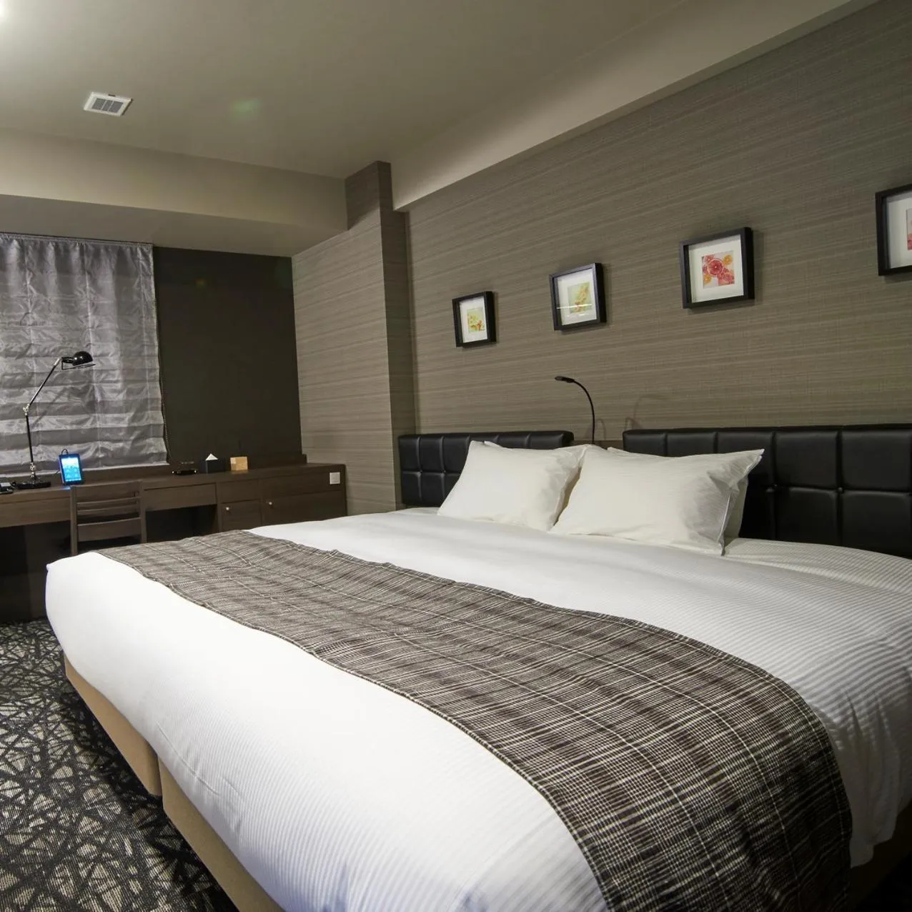 Bed in QuintessaHotel TokyoHaneda Comic&Books