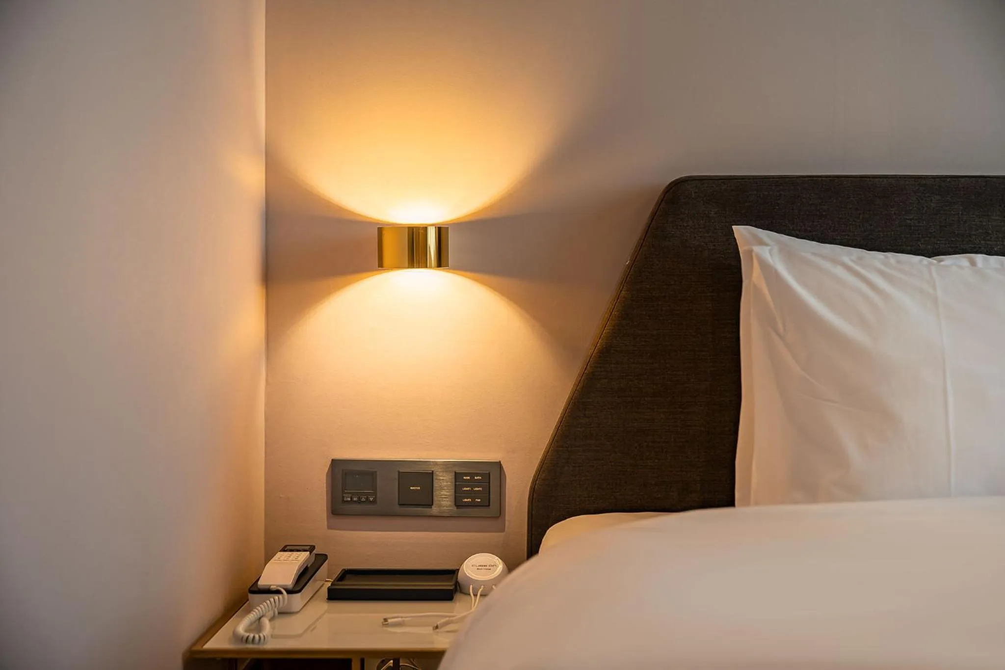 Bed in Brown Dot Hotel Signature