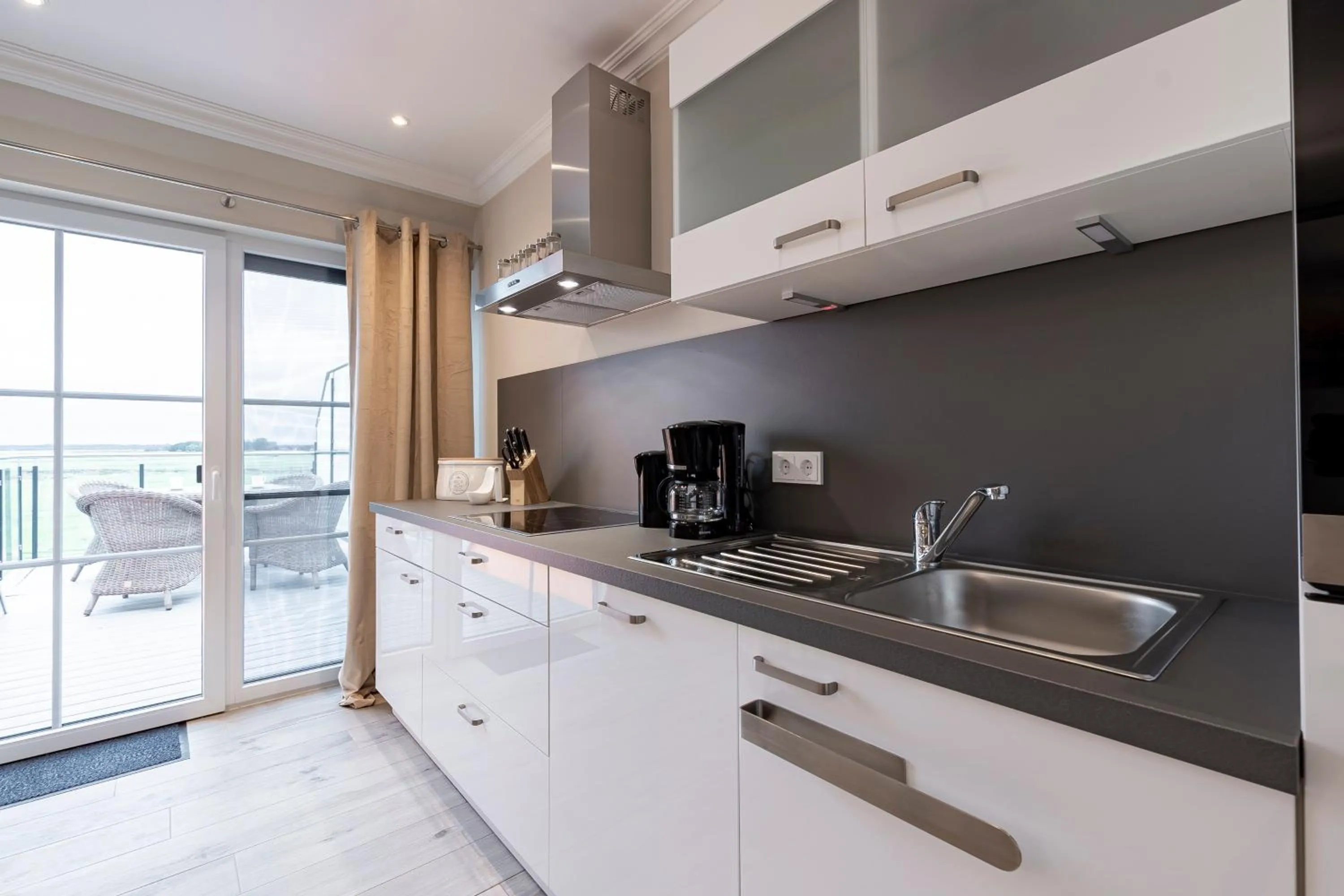 Kitchen or kitchenette in Luxus Resort Rügen Residenz Kubitzer Bodden