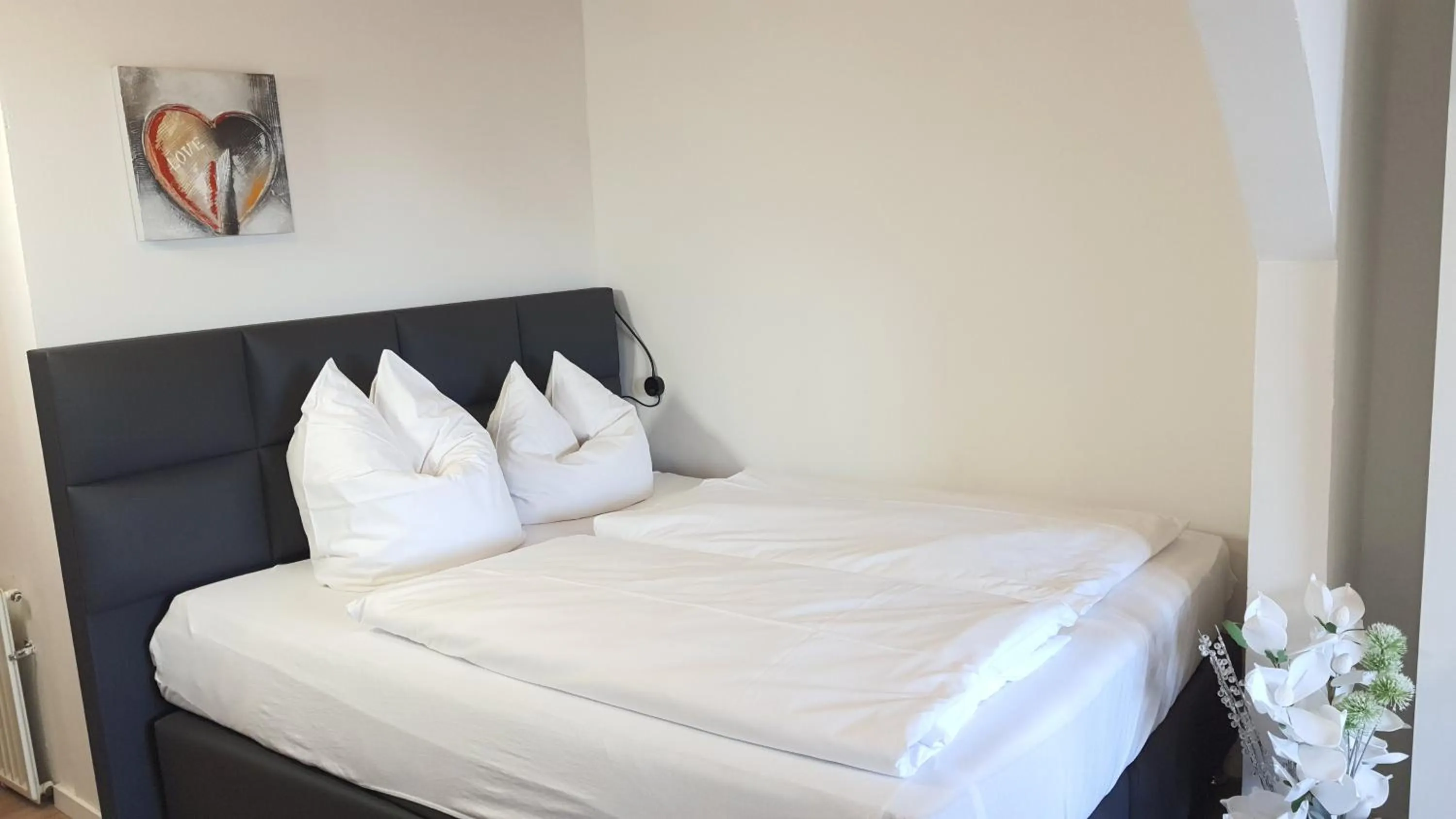 Bed in Hotel Schneiderhof