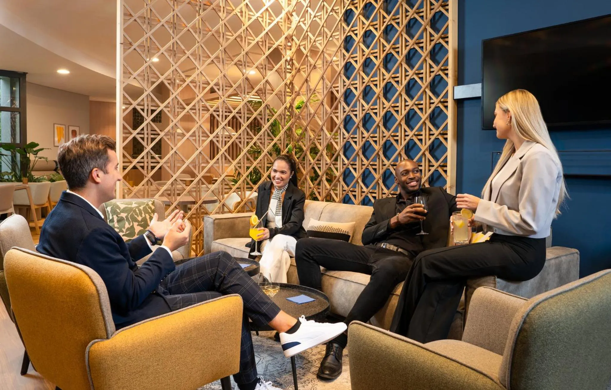 Lounge or bar in voco Vienna Prater by IHG