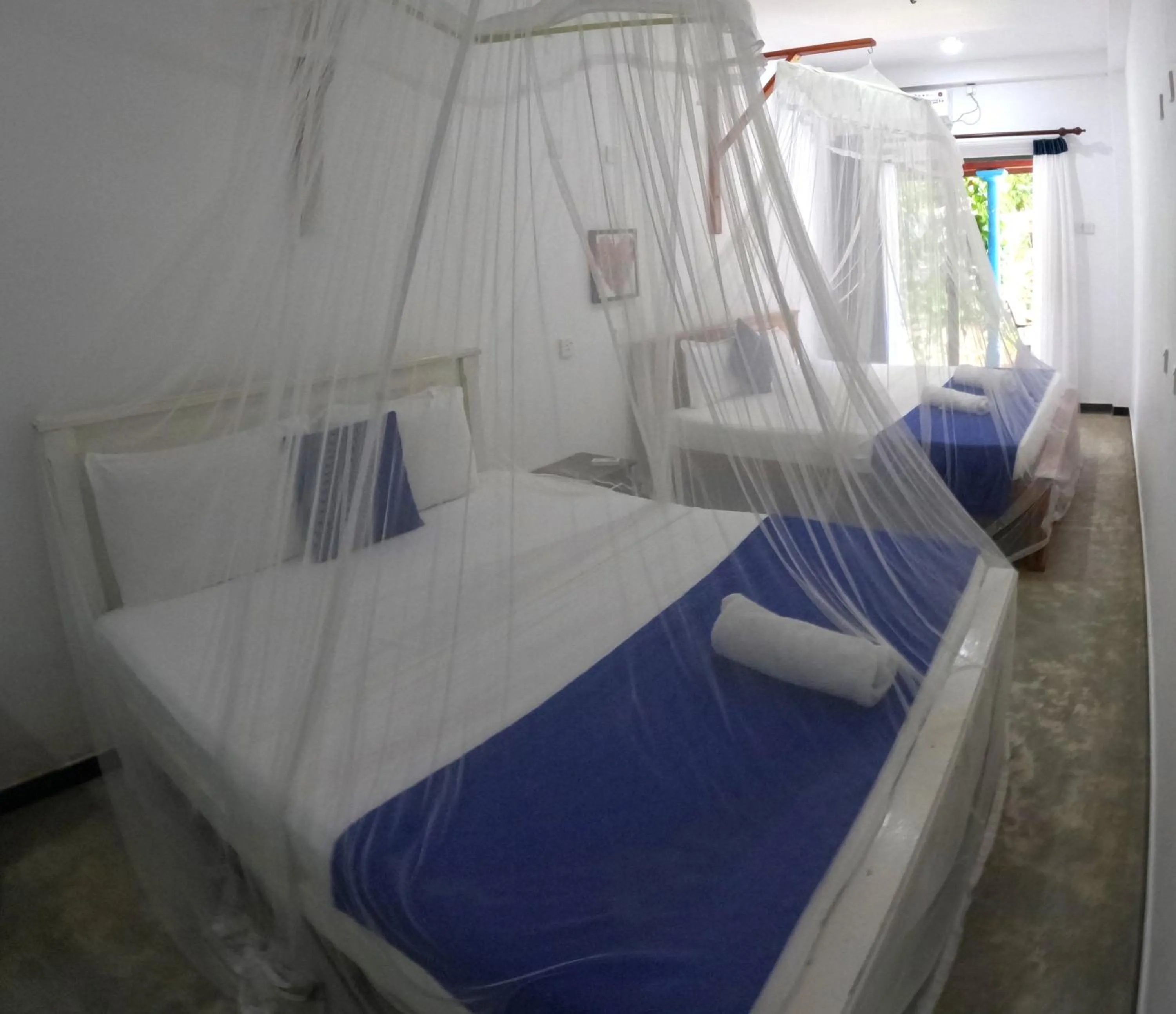 Bed in Mirissa Blue Whale Holiday Hotel