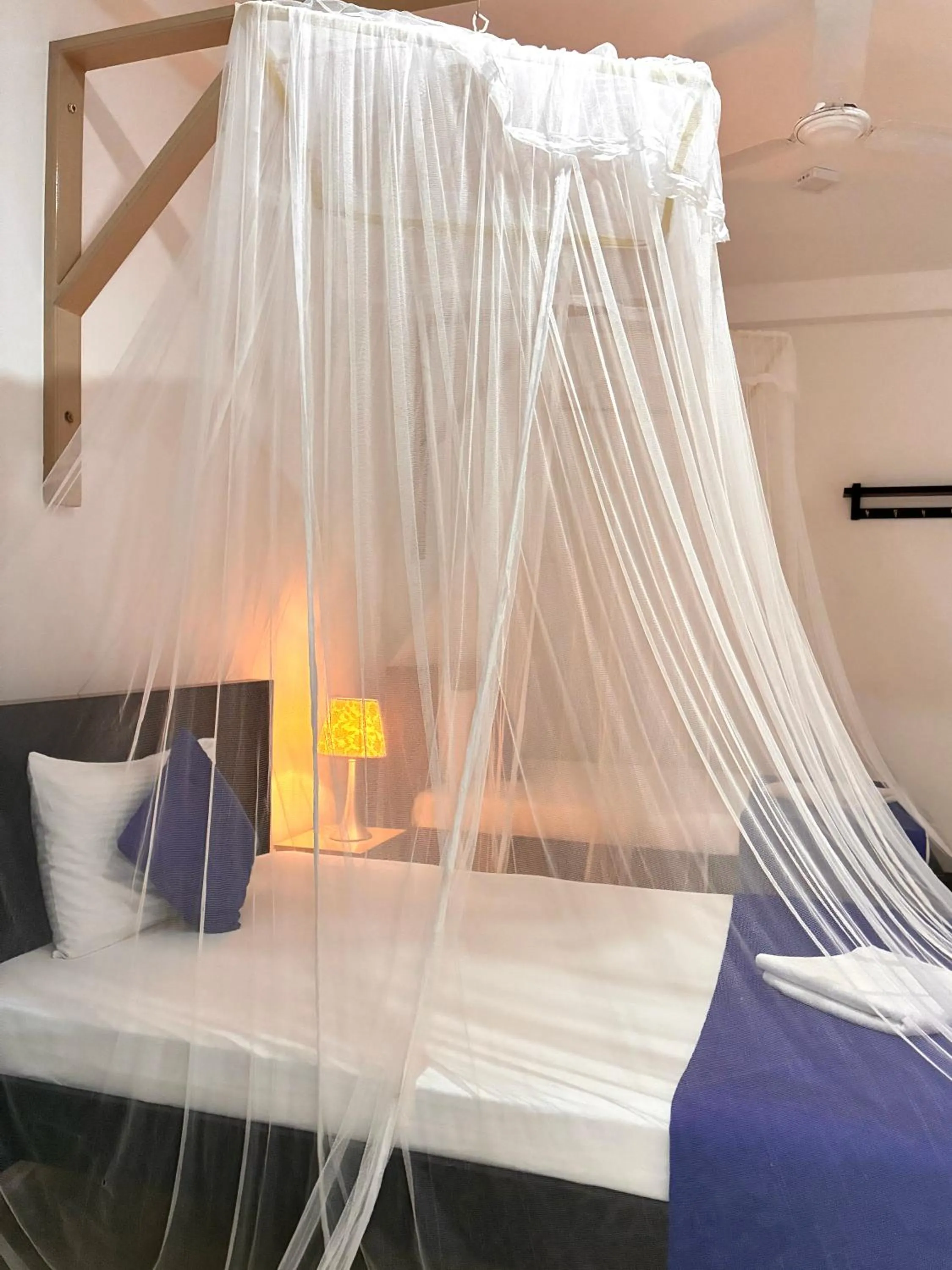 Bed in Mirissa Blue Whale Holiday Hotel