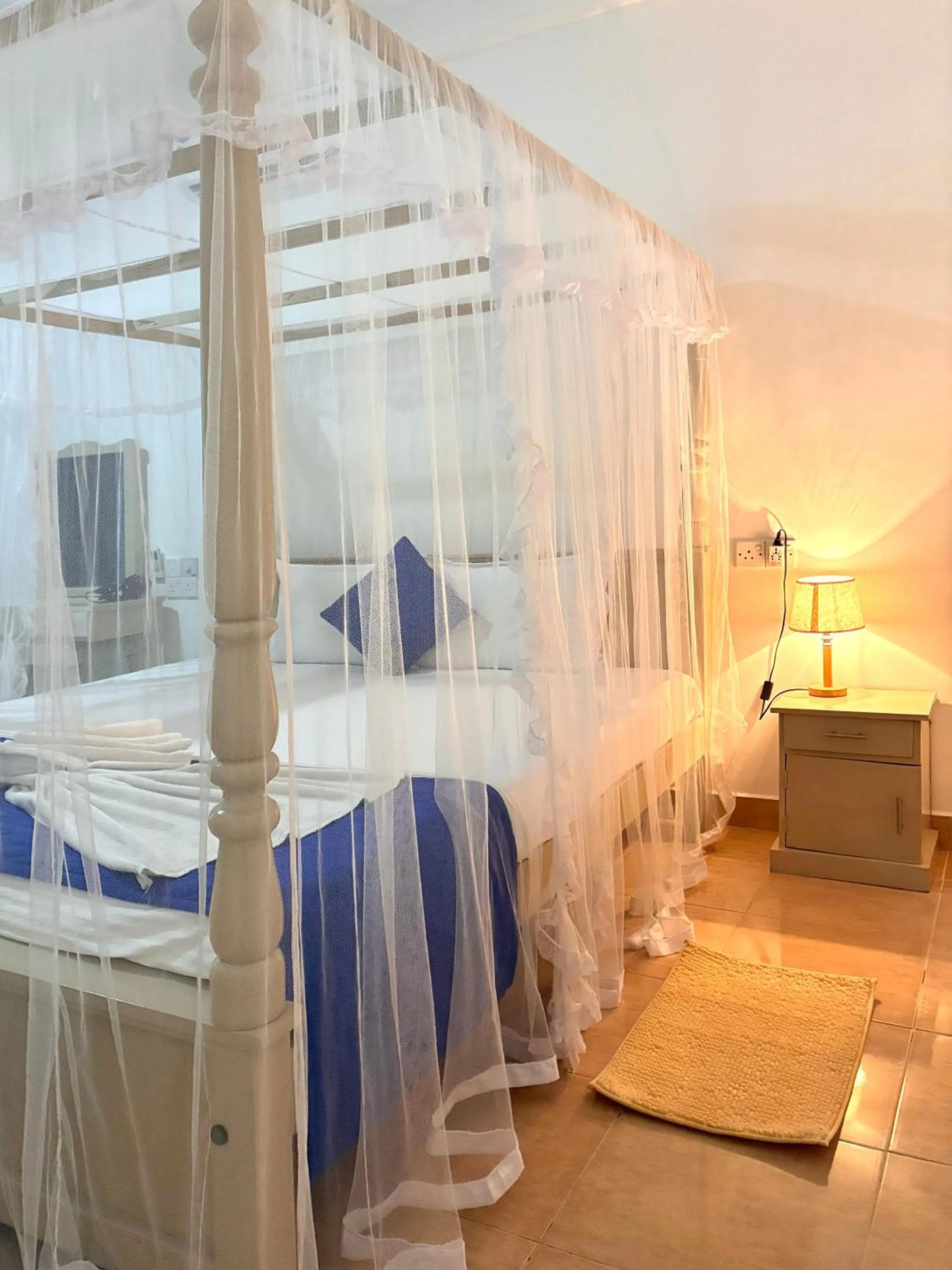 Bed in Mirissa Blue Whale Holiday Hotel