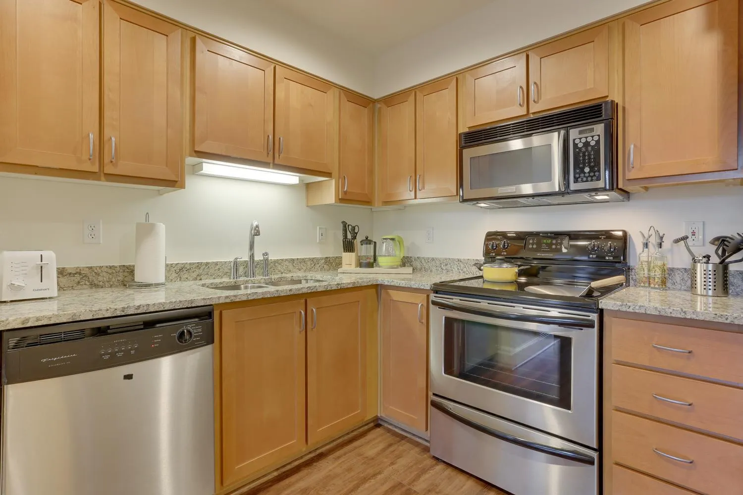 Kitchen or kitchenette in Renu Suites at The Burlington Portland