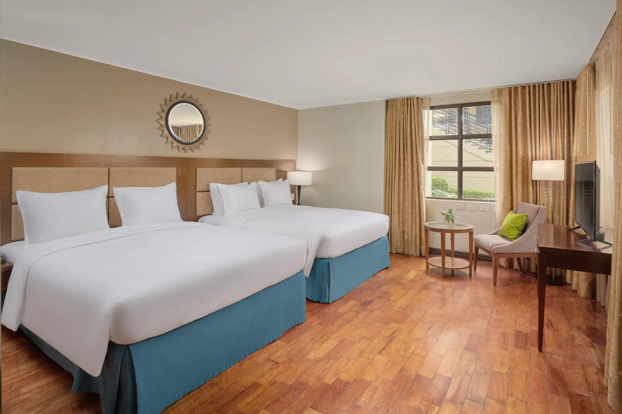 Photo of the whole room, Bed in Holiday Inn & Suites Batangas LimaPark by IHG