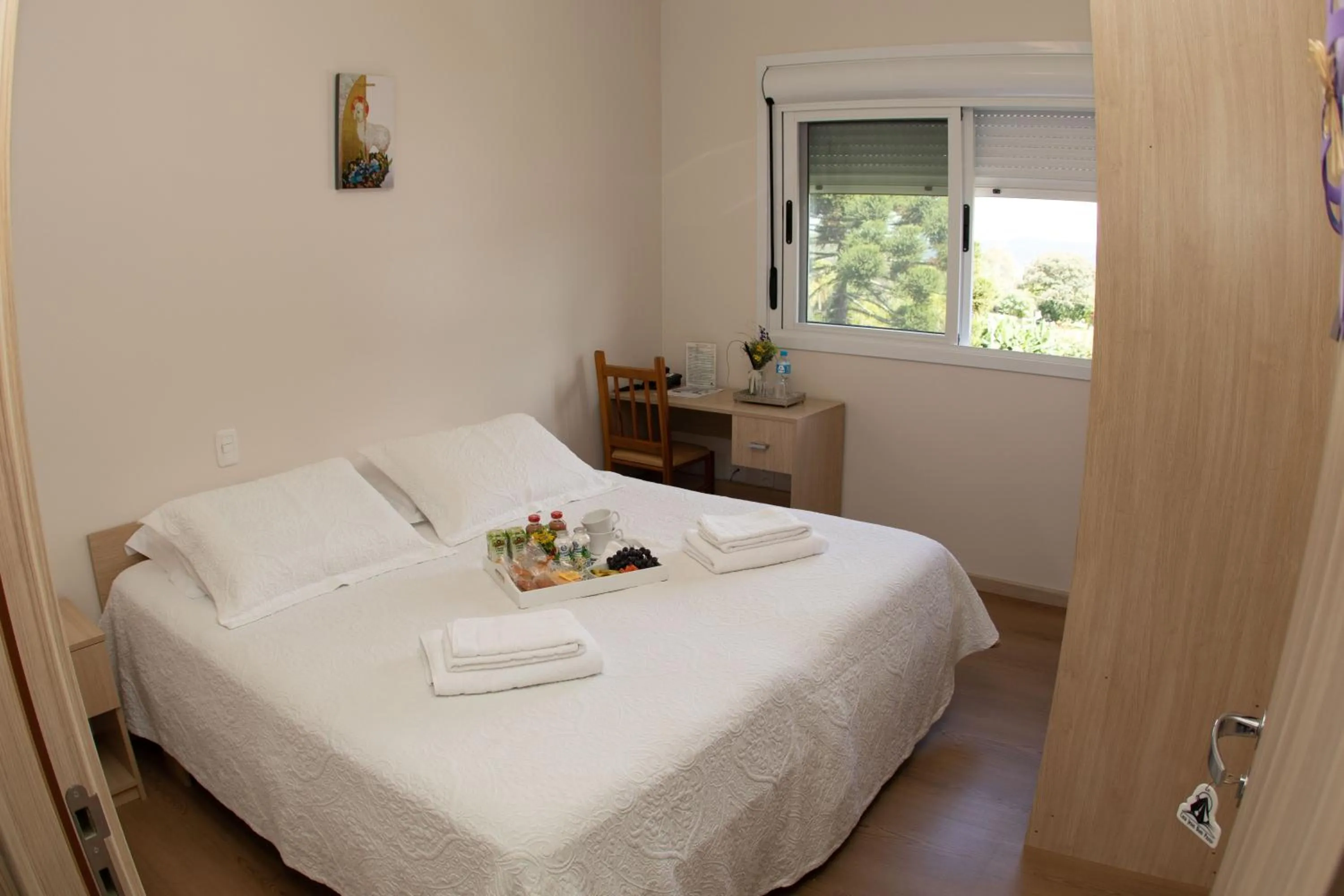 Bed in Pousada Bom Pastor