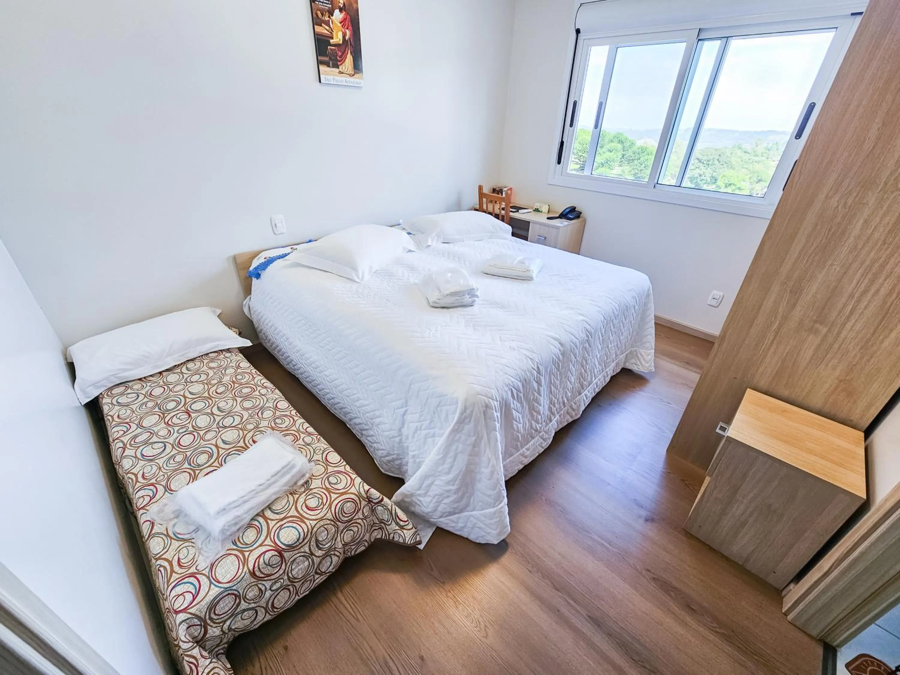 Bed in Pousada Bom Pastor