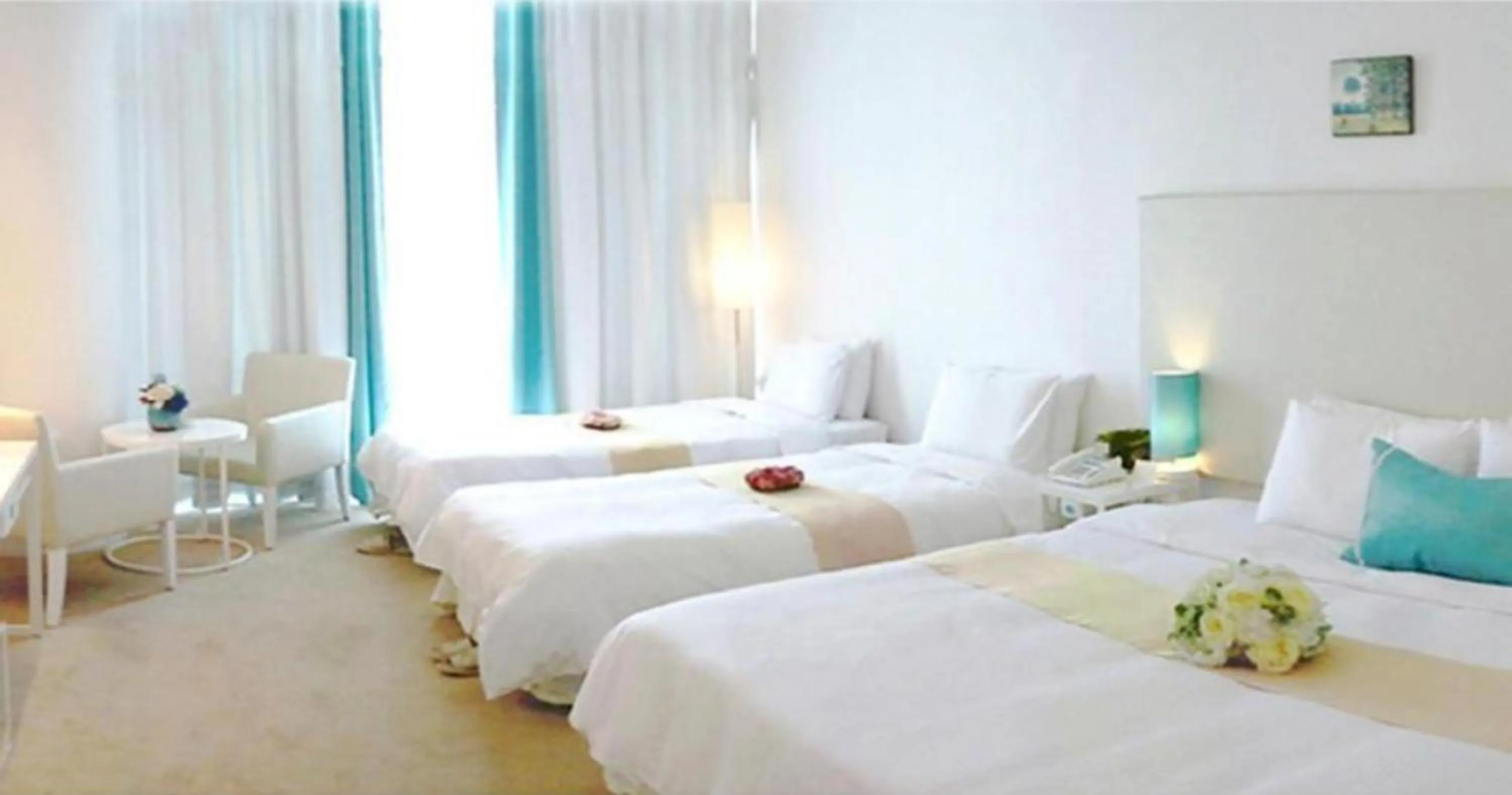 Bed in Ecograd Hotel